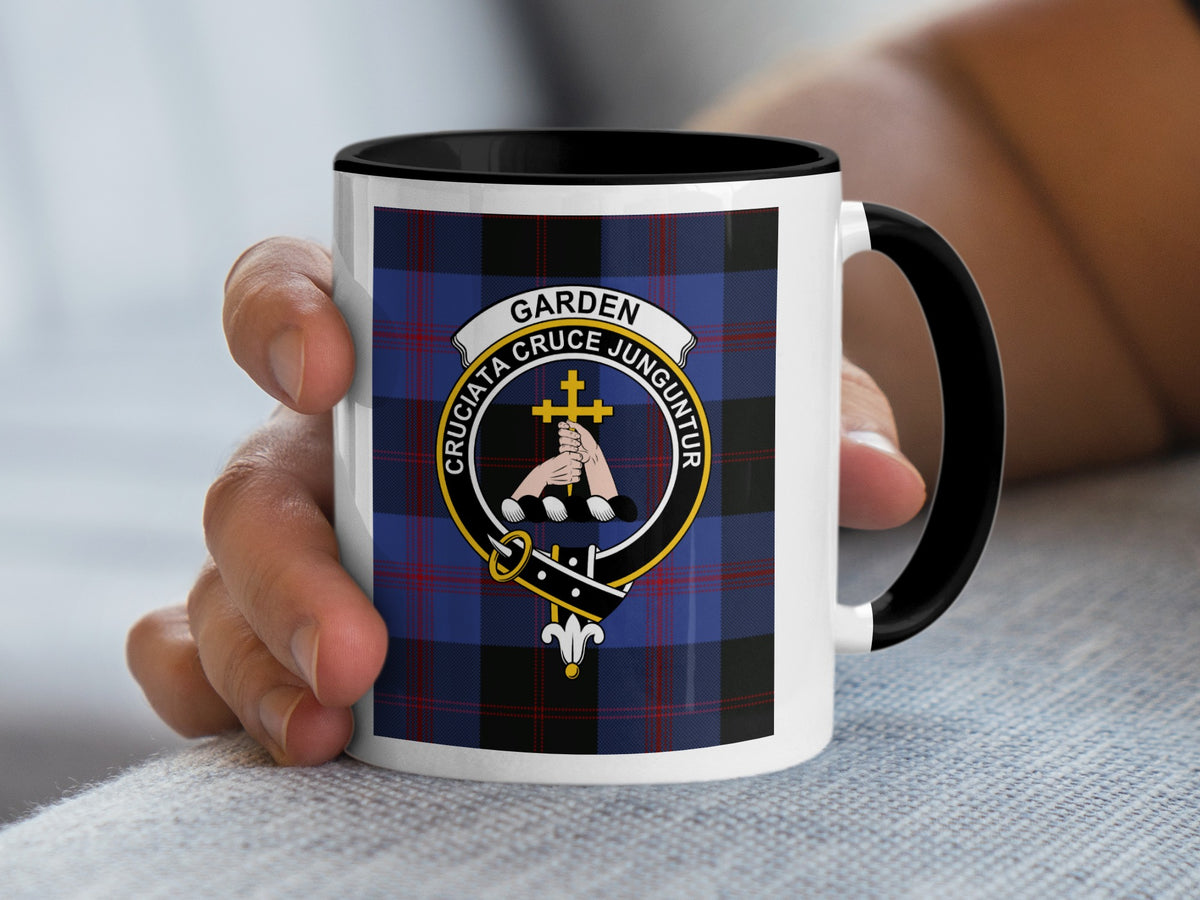 Garden Scottish family crest artwork on an 11 oz black accent mug with a tartan background