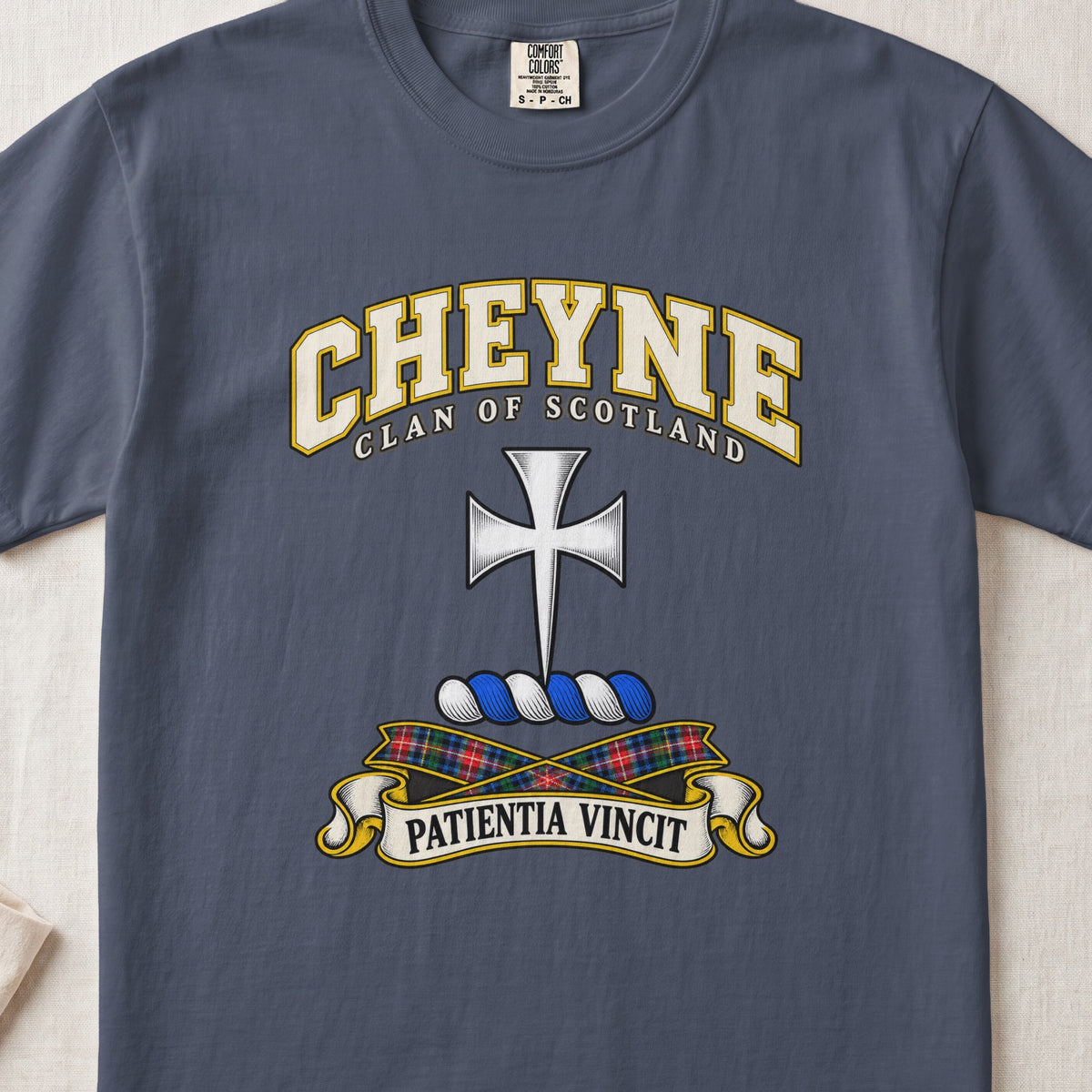 Cheyne Scottish clan T-shirt in Midnight, front view with a silver cross with flared arms and motto design.
