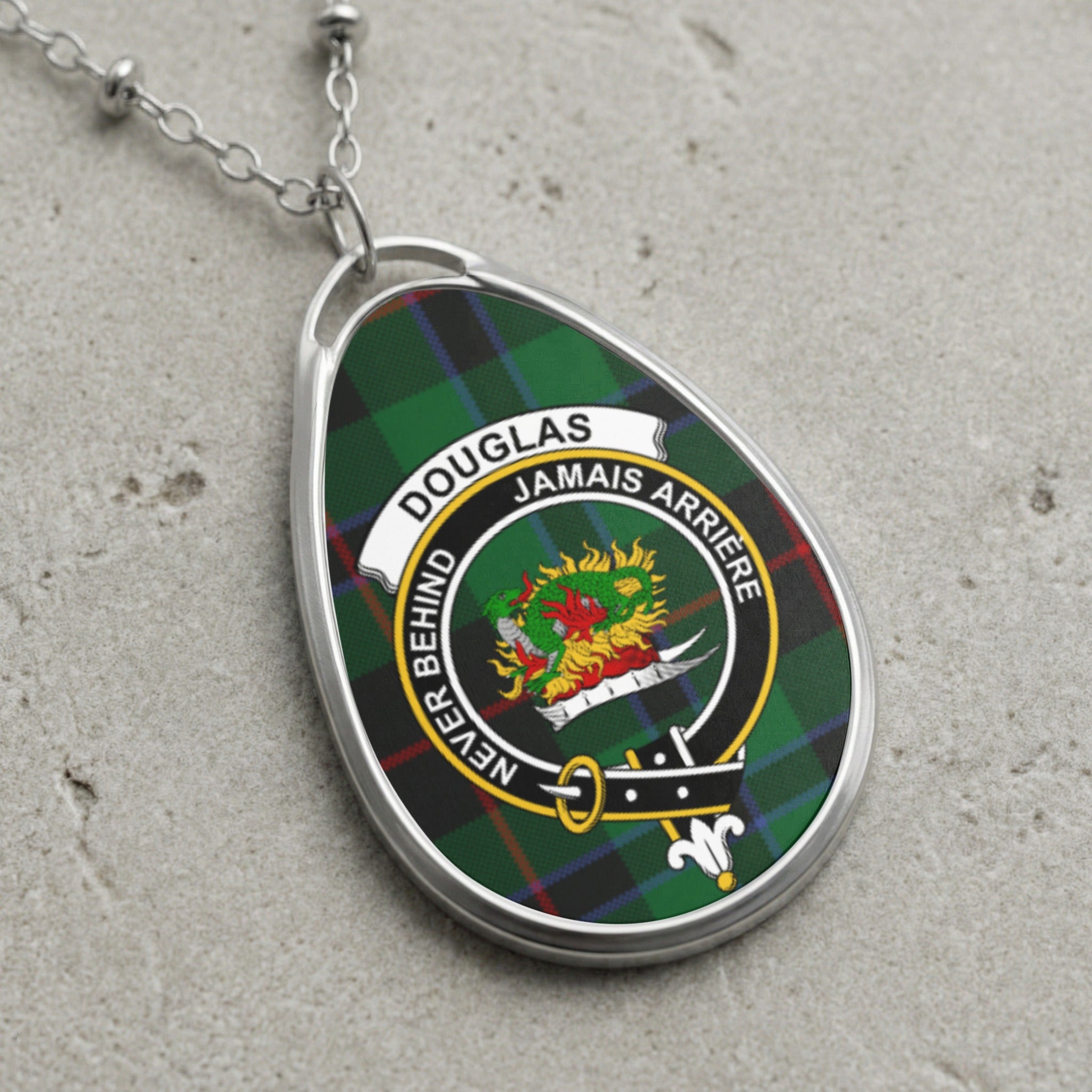 Douglas clan Scottish tartan necklace with clan crest on tartan background