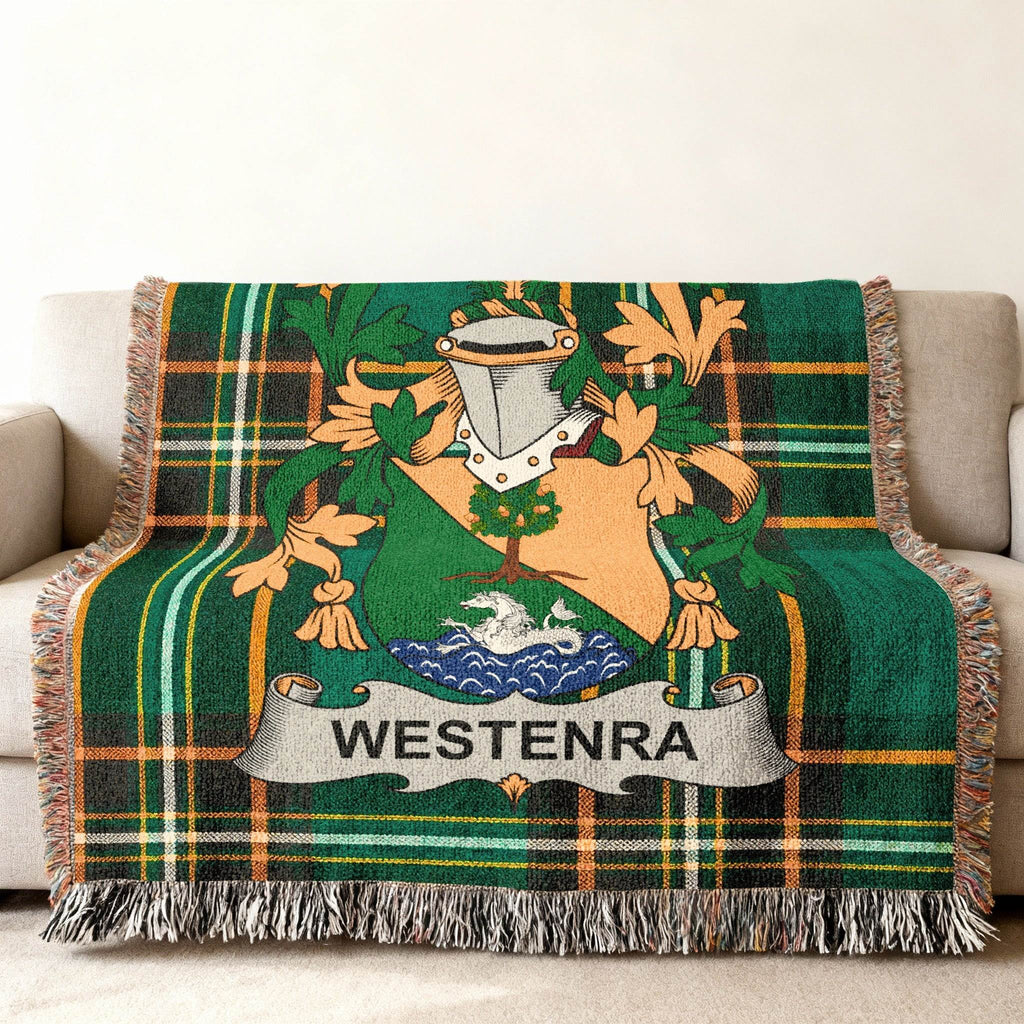 Woven plaid throw blanket with a family crest and "WESTENRA" text.