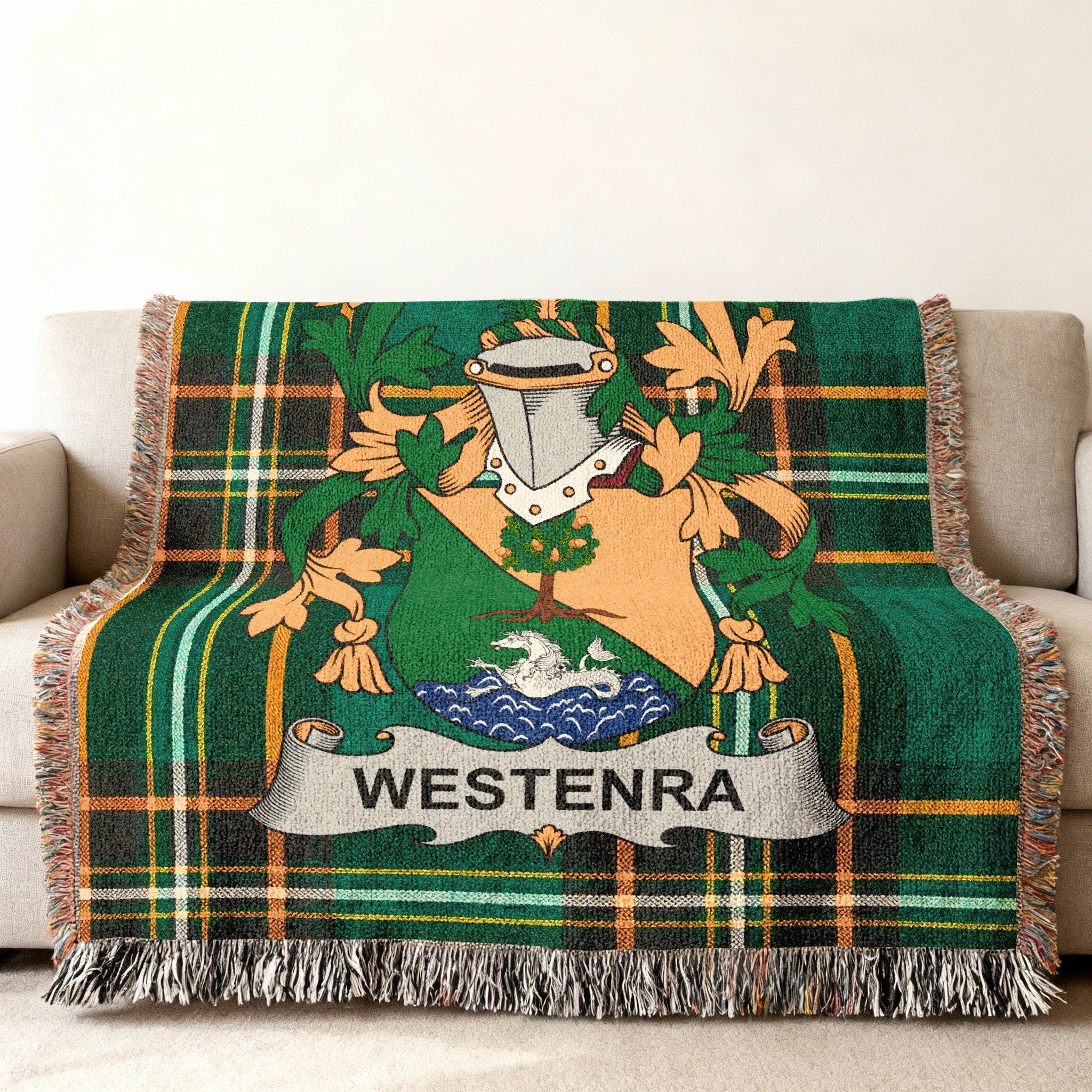 Woven plaid throw blanket with a family crest and "WESTENRA" text.