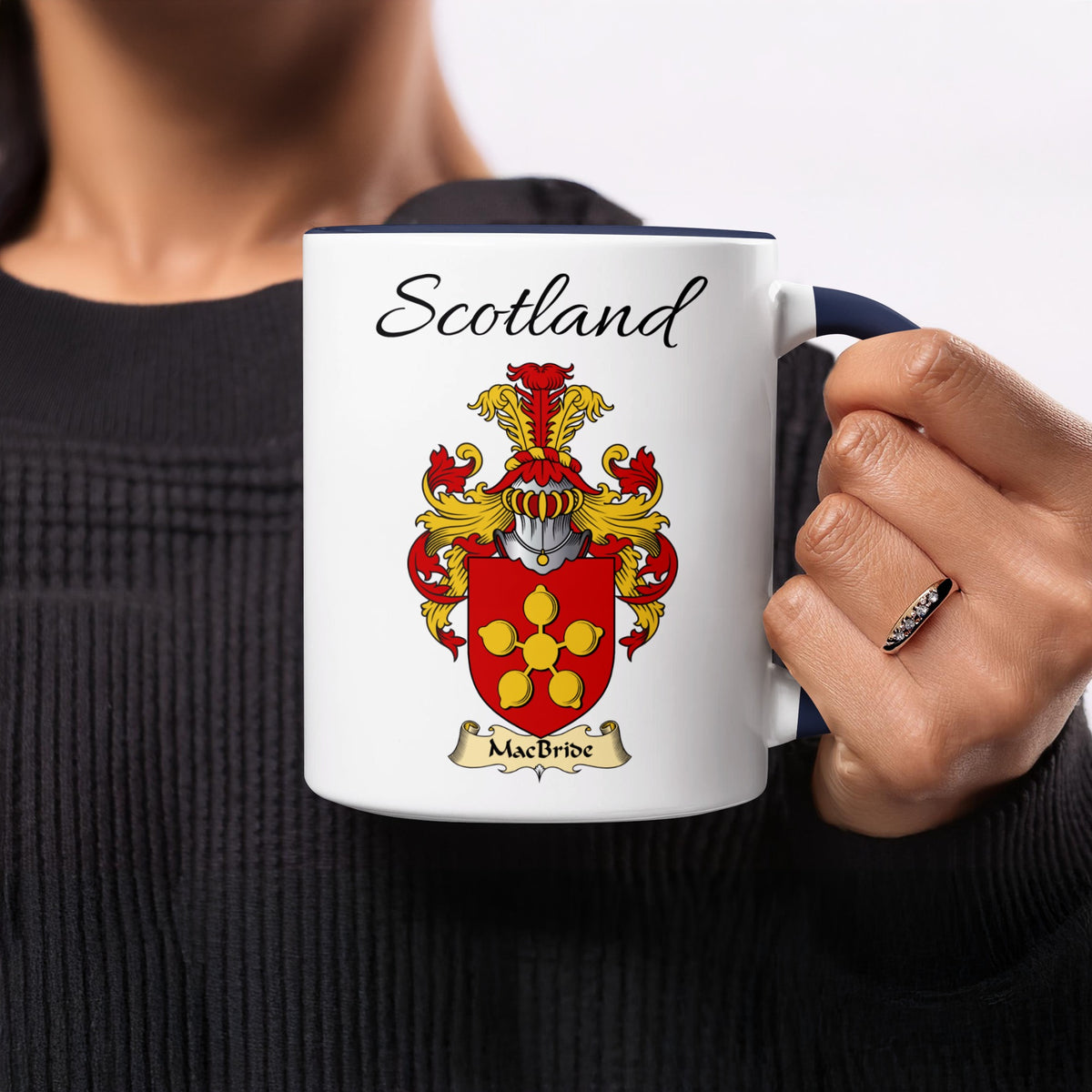 MacBride 11 oz Scottish family crest ceramic mug showing a Scotland-topped heraldic emblem