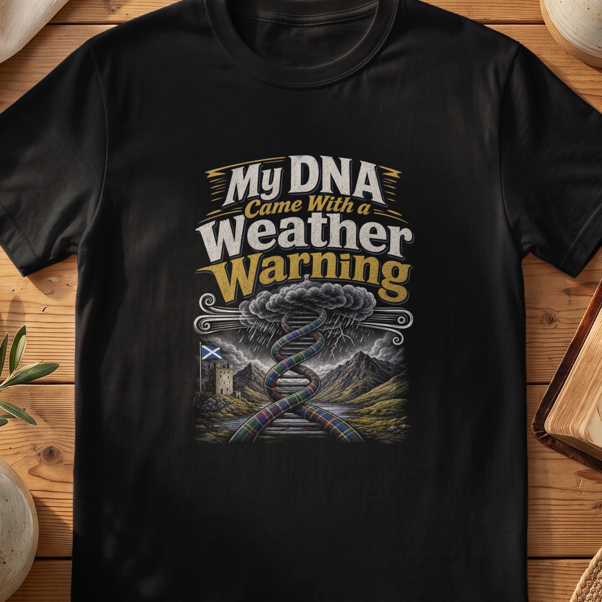 Black Gildan 64000 unisex T-shirt flatlay with My DNA Came With a Weather Warning Scottish graphic design