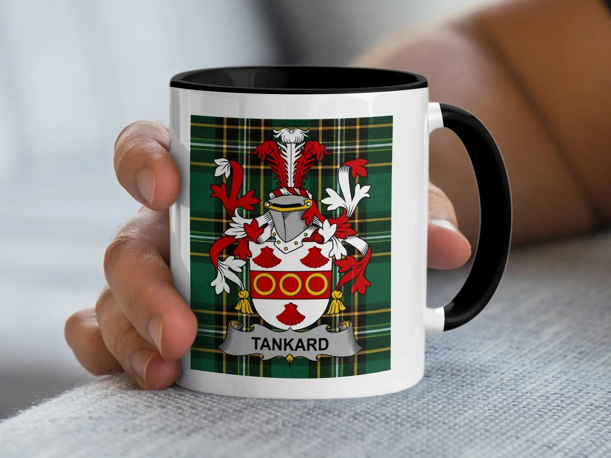Mug with a tartan pattern and the surname "TANKARD" on a coat of arms.