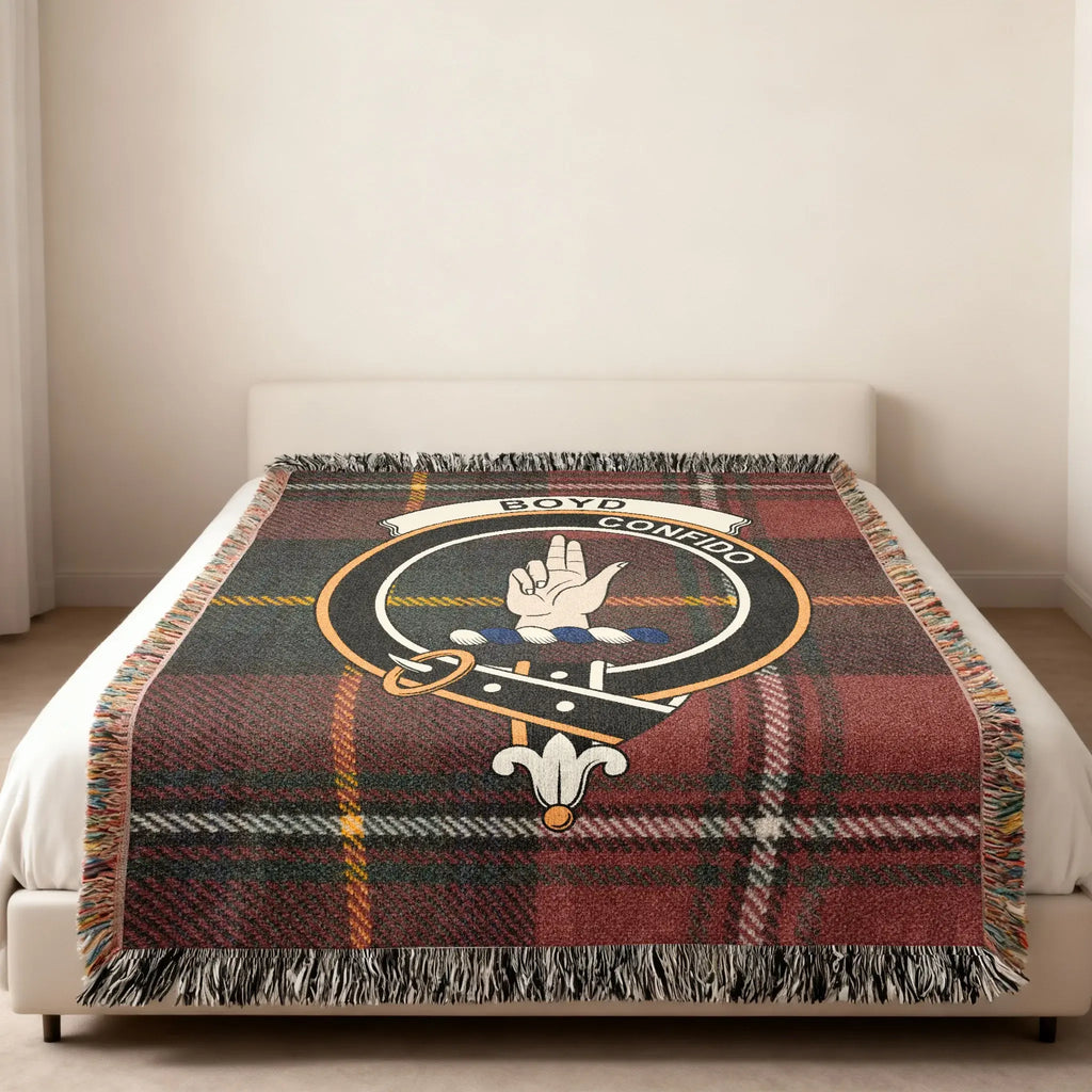 Boyd tartan woven blanket 60x50 in bedroom setting — clan crest at centre of cotton weave