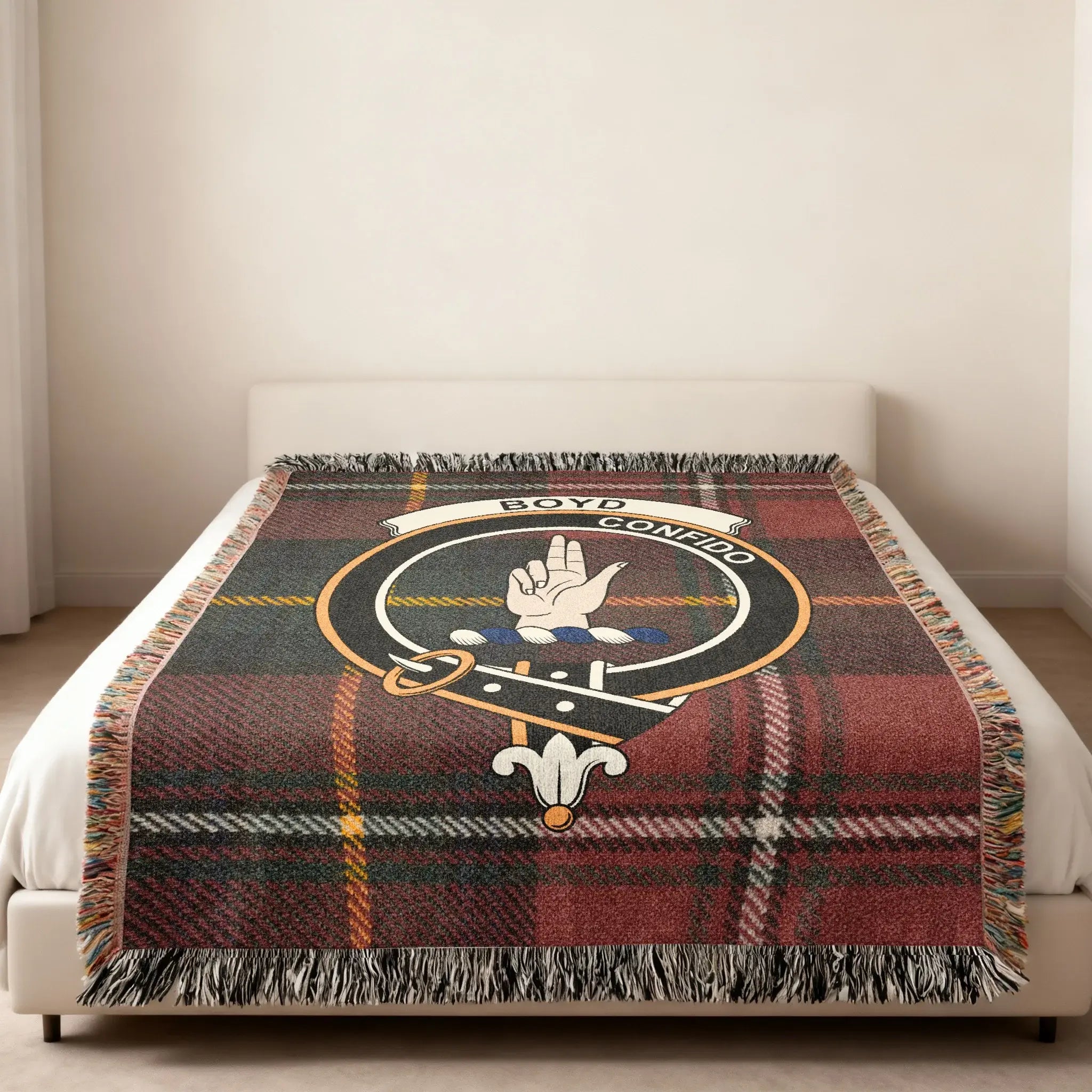 Boyd tartan woven blanket 60x50 in bedroom setting — clan crest at centre of cotton weave