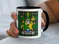 Mug with a coat of arms featuring a green and yellow plaid background and "WESTENRA" text.