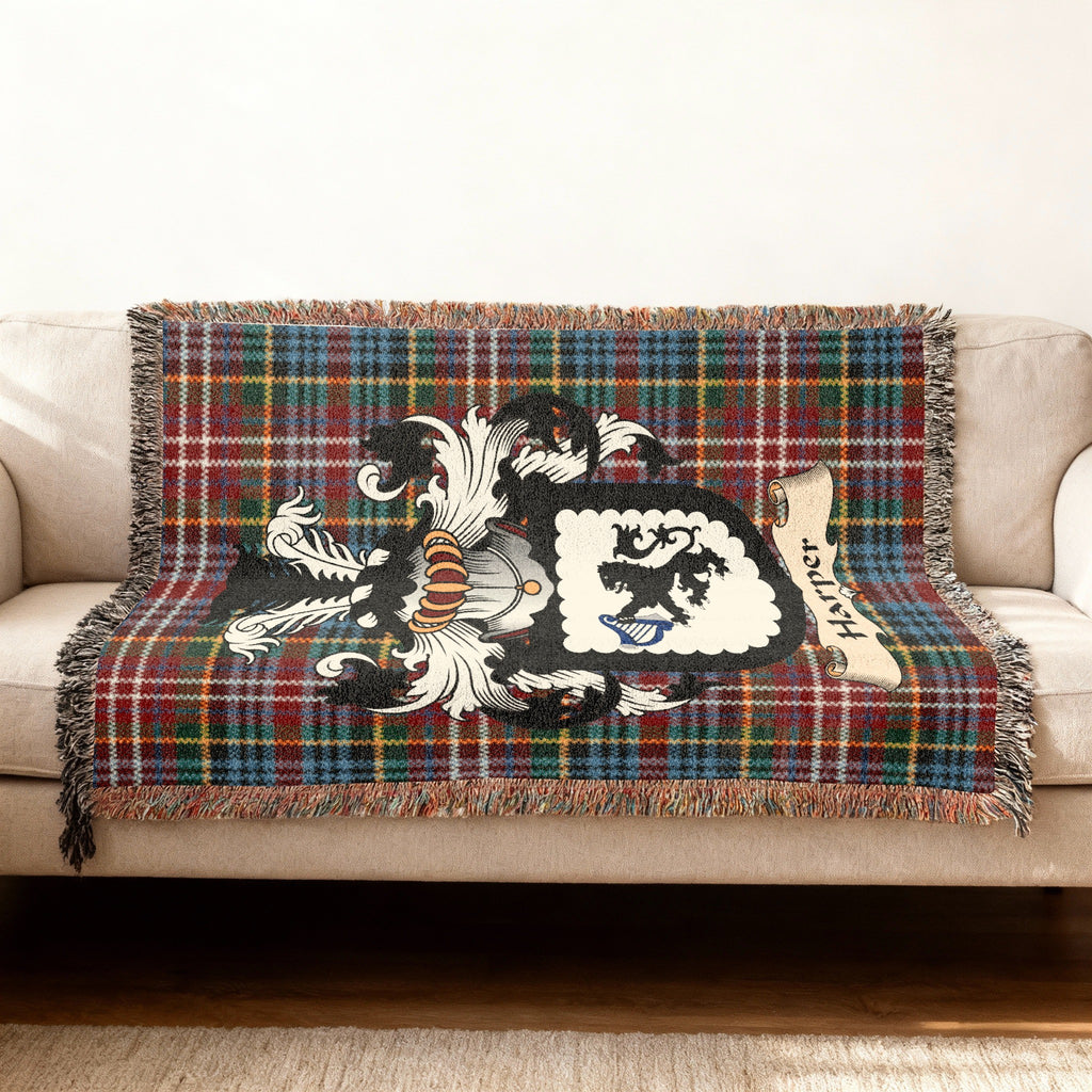 Harper Scottish woven blanket with family shield and Caledonia tartan background