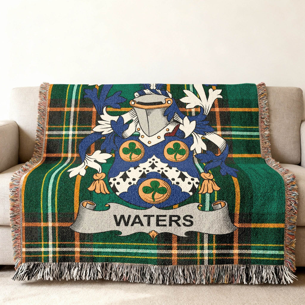 Green plaid throw blanket featuring the Waters family crest.