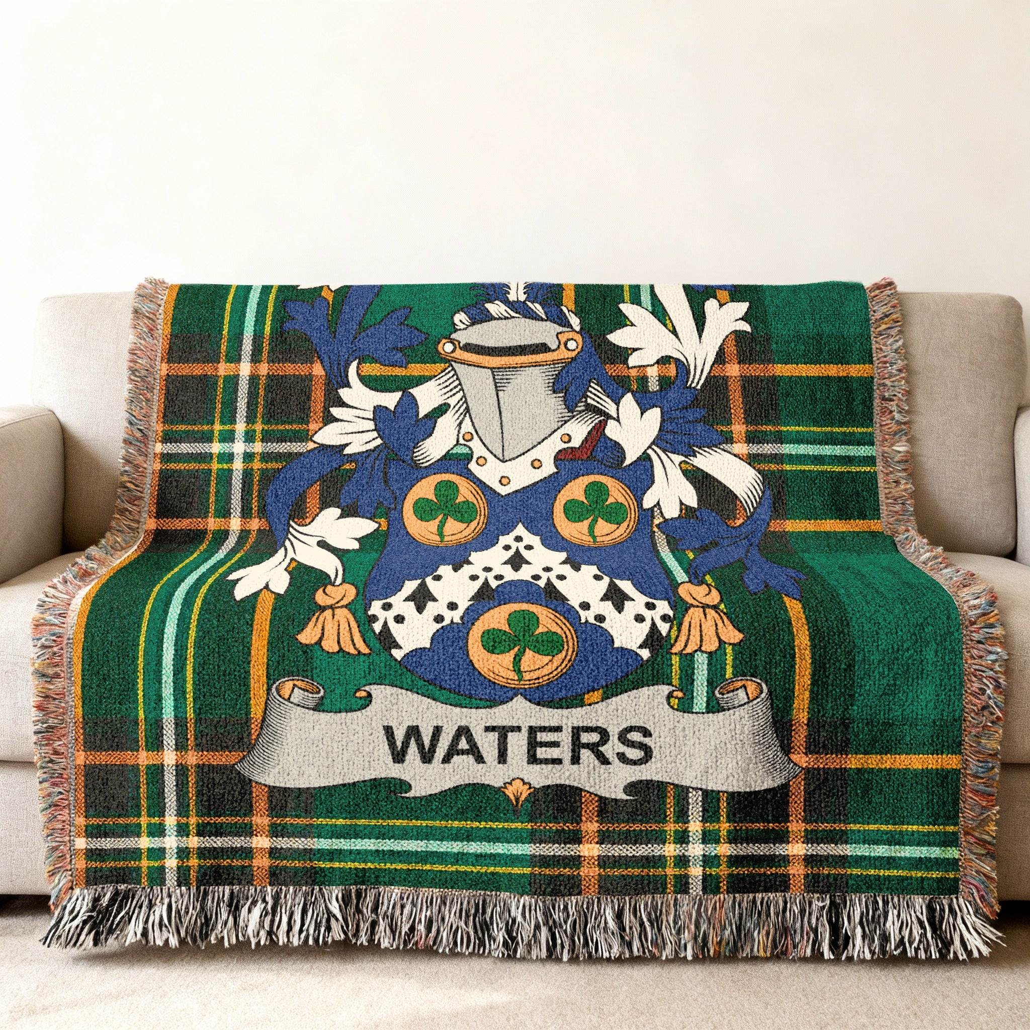Green plaid throw blanket featuring the Waters family crest.