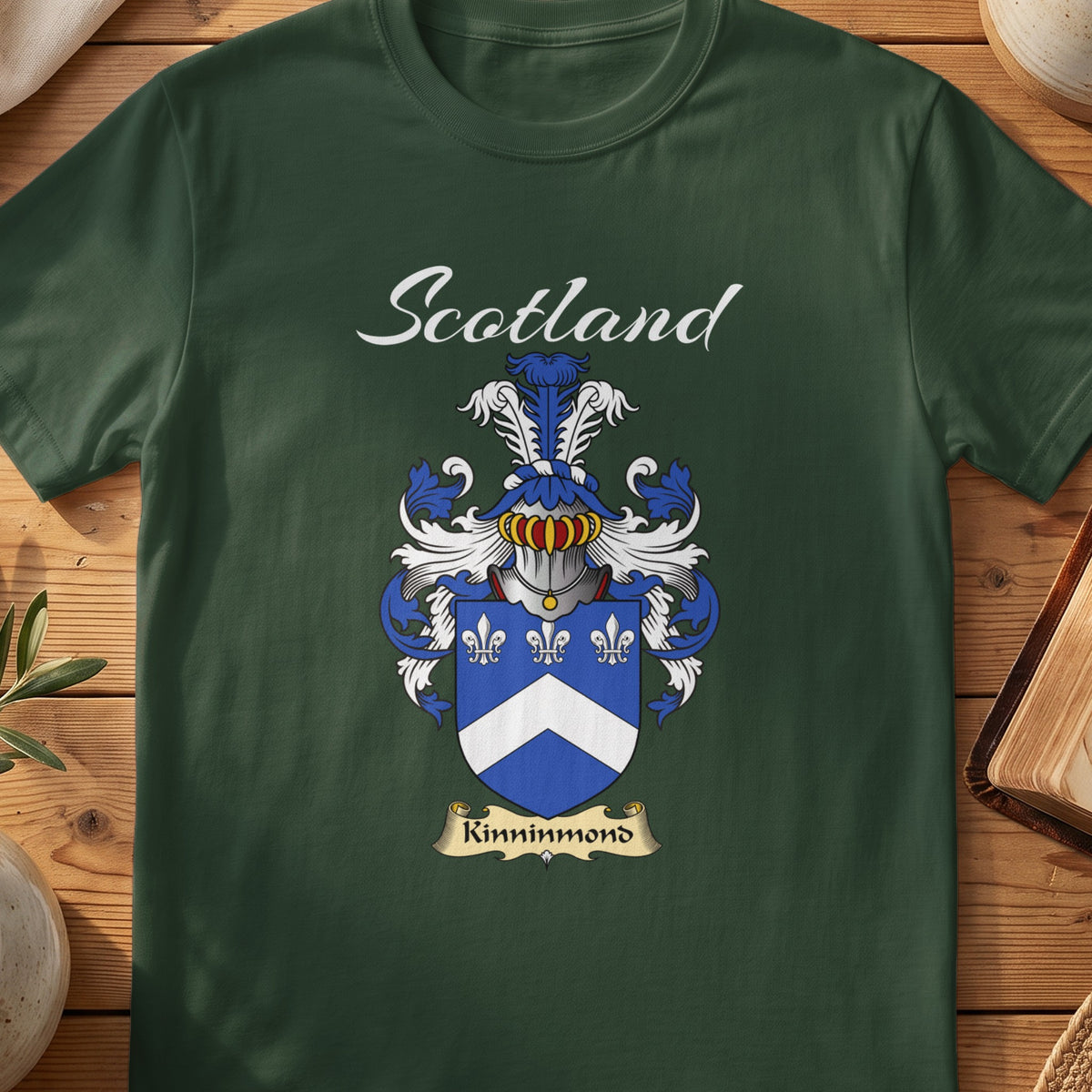 Forest Green Kinninmond Scottish T-shirt featuring a white chevron and fleurs-de-lis on blue