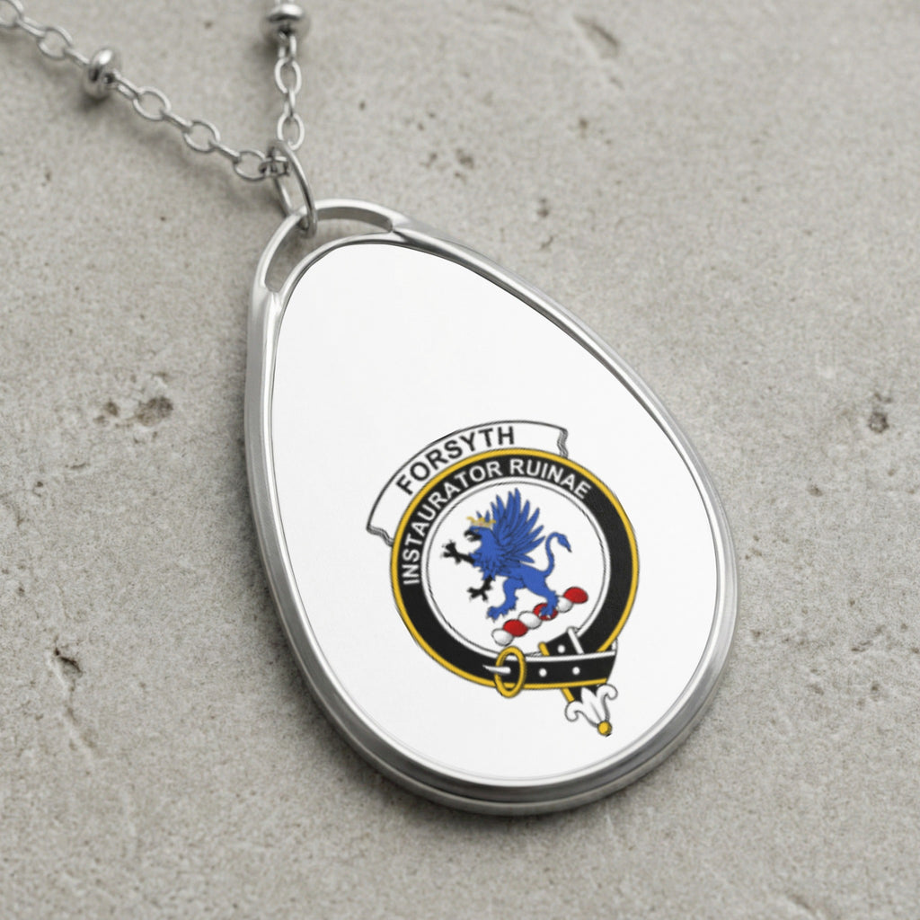Oval pendant necklace with Forsyth clan crest and Latin motto.
