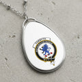Oval pendant necklace with Forsyth clan crest and Latin motto.