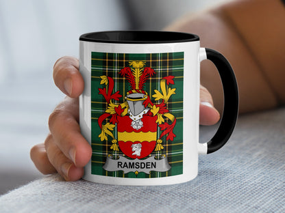 White mug with black rim features a tartan pattern and Ramsden family crest.