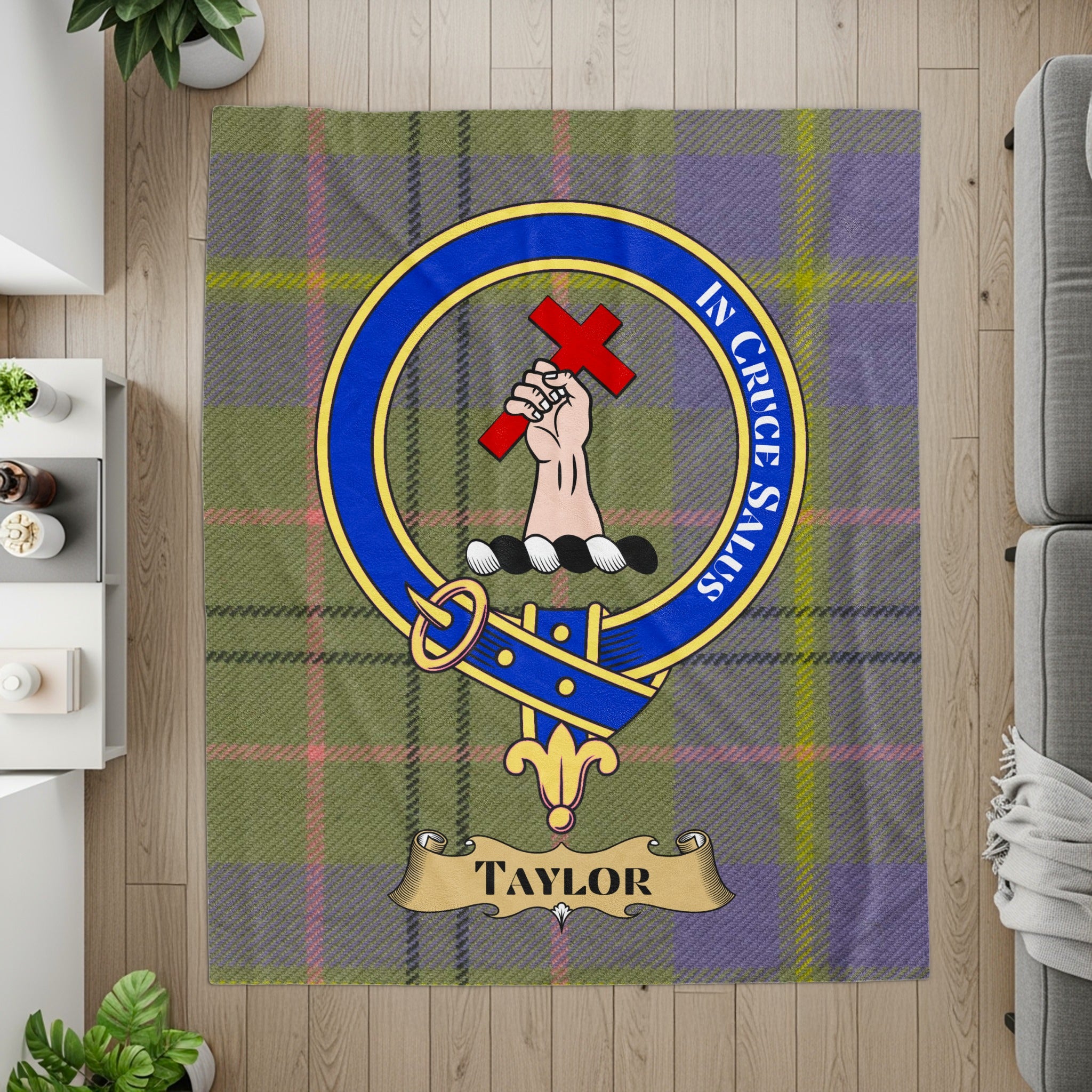 Taylor crest with In Cruce Salus motto on tartan printed throw — detail
