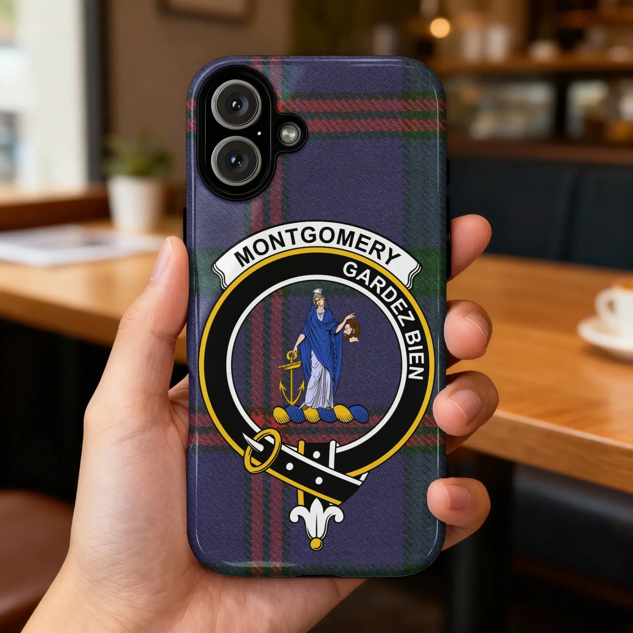 Clan Montgomery Gardez Bien tartan phone case — glossy full-wrap print with clan crest on iPhone