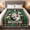 Plaid blanket with a coat of arms and the name "Palliser".