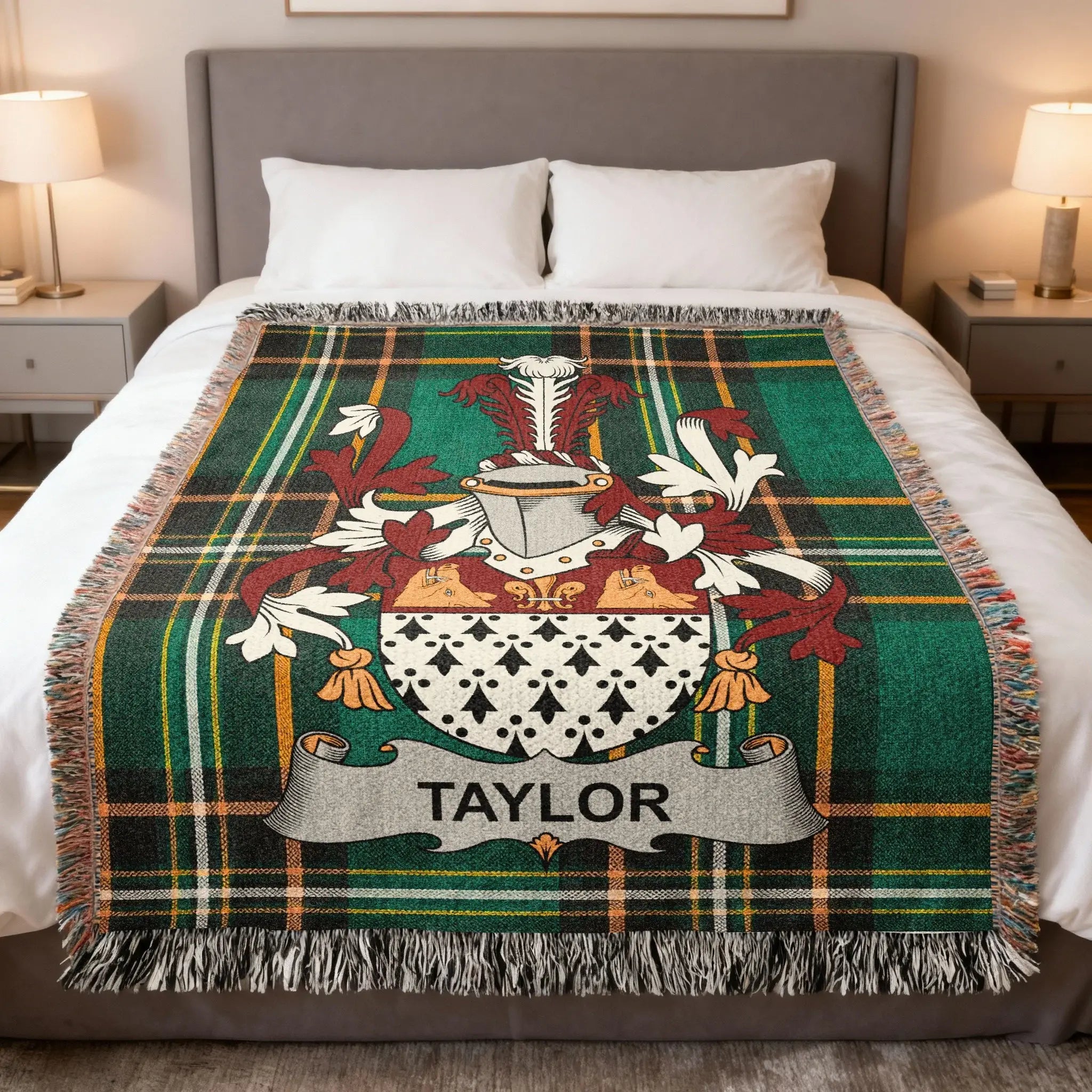 Tartan blanket with the Taylor family crest draped on a bed.
