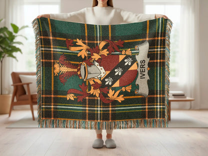 Tartan throw blanket with Ivers family crest and fringe detail.