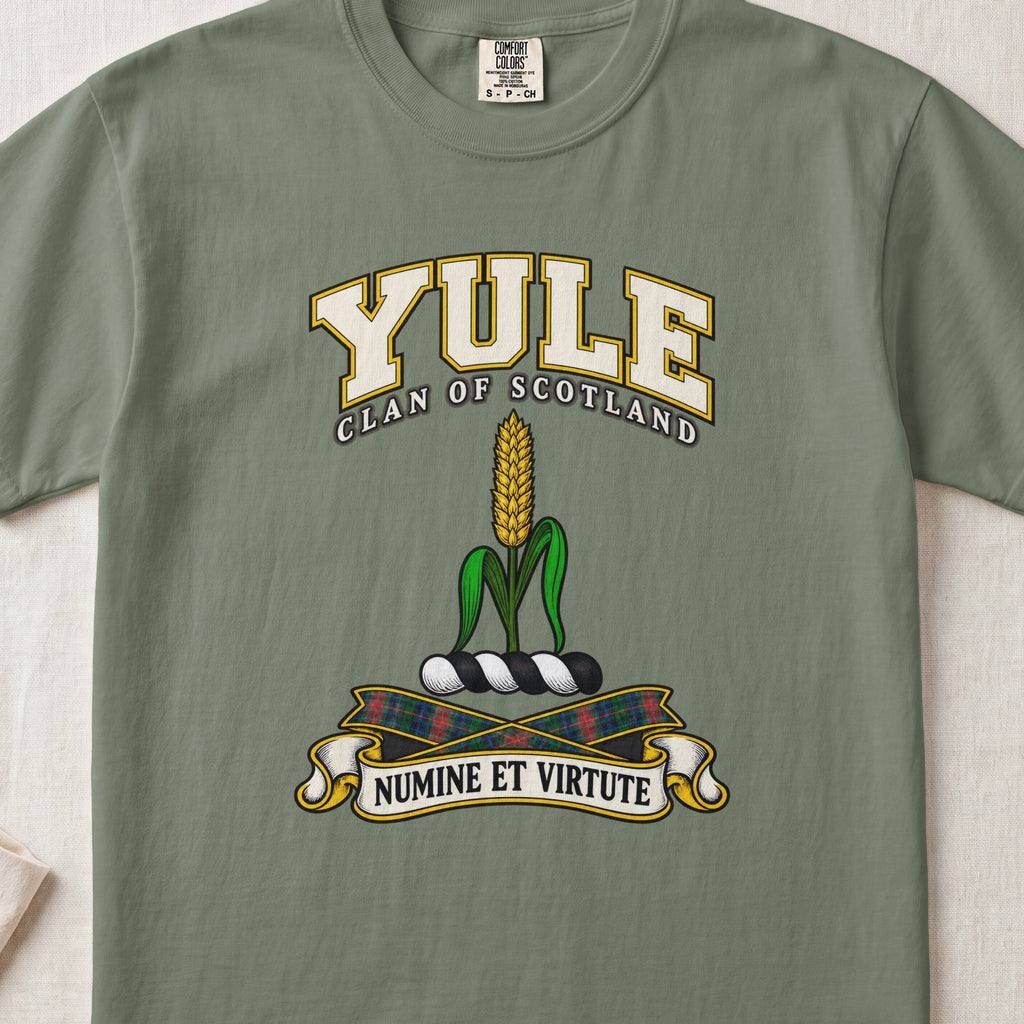 Yule Scottish clan T-shirt in Moss, front view with a golden ear of grain with green leaves and motto design.