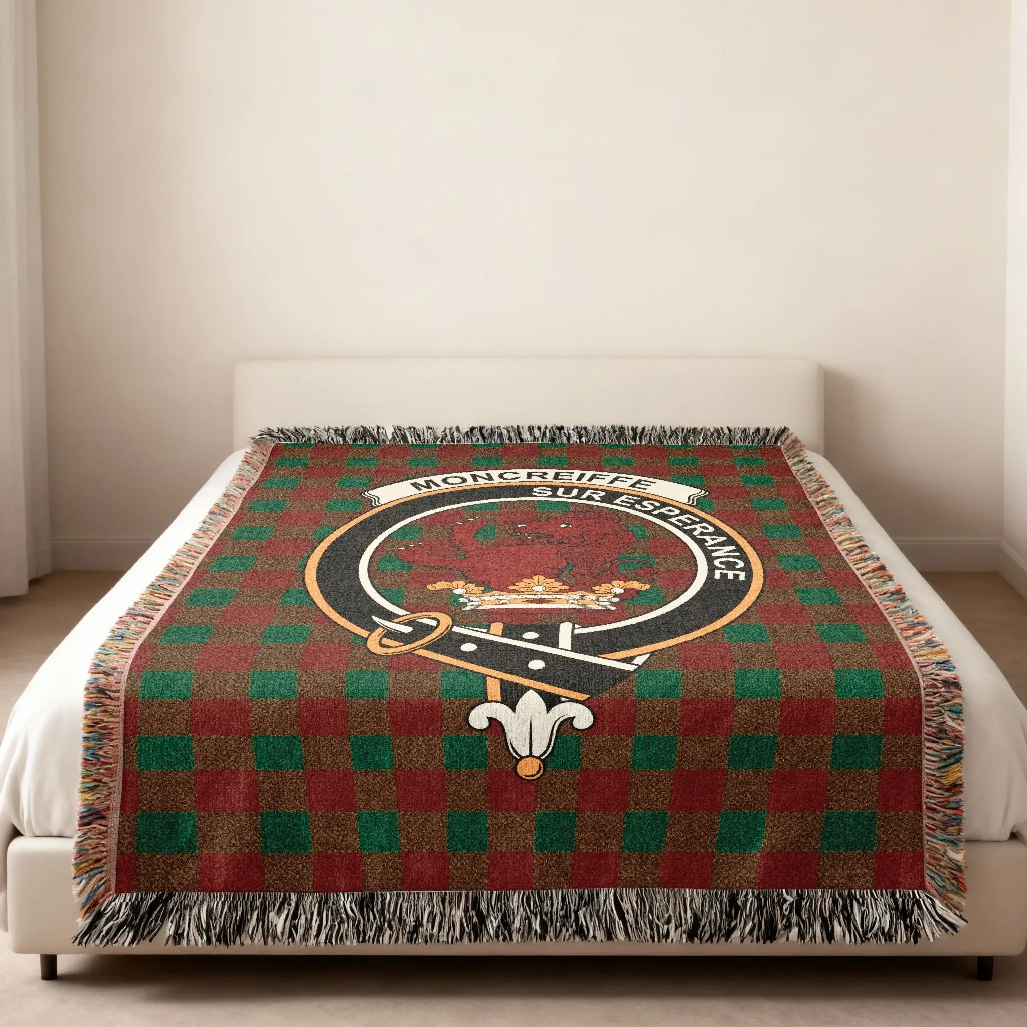 Moncreiffe clan crest tartan woven blanket folded with fringe — red lion crest on cotton plaid