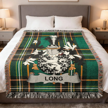 Green tartan blanket with a coat of arms and "LONG" banner.