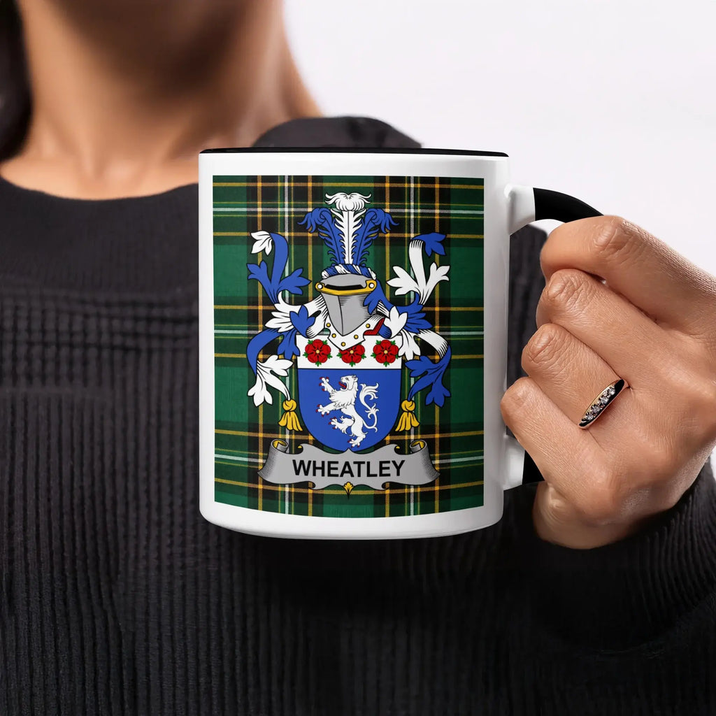 Mug with Wheatley family crest on tartan background.