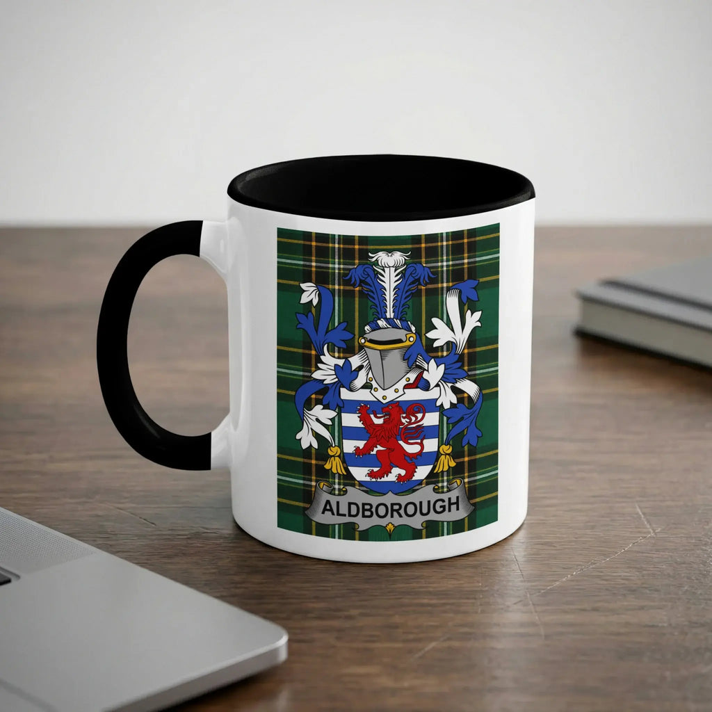 Mug with Aldborough coat of arms on plaid background.