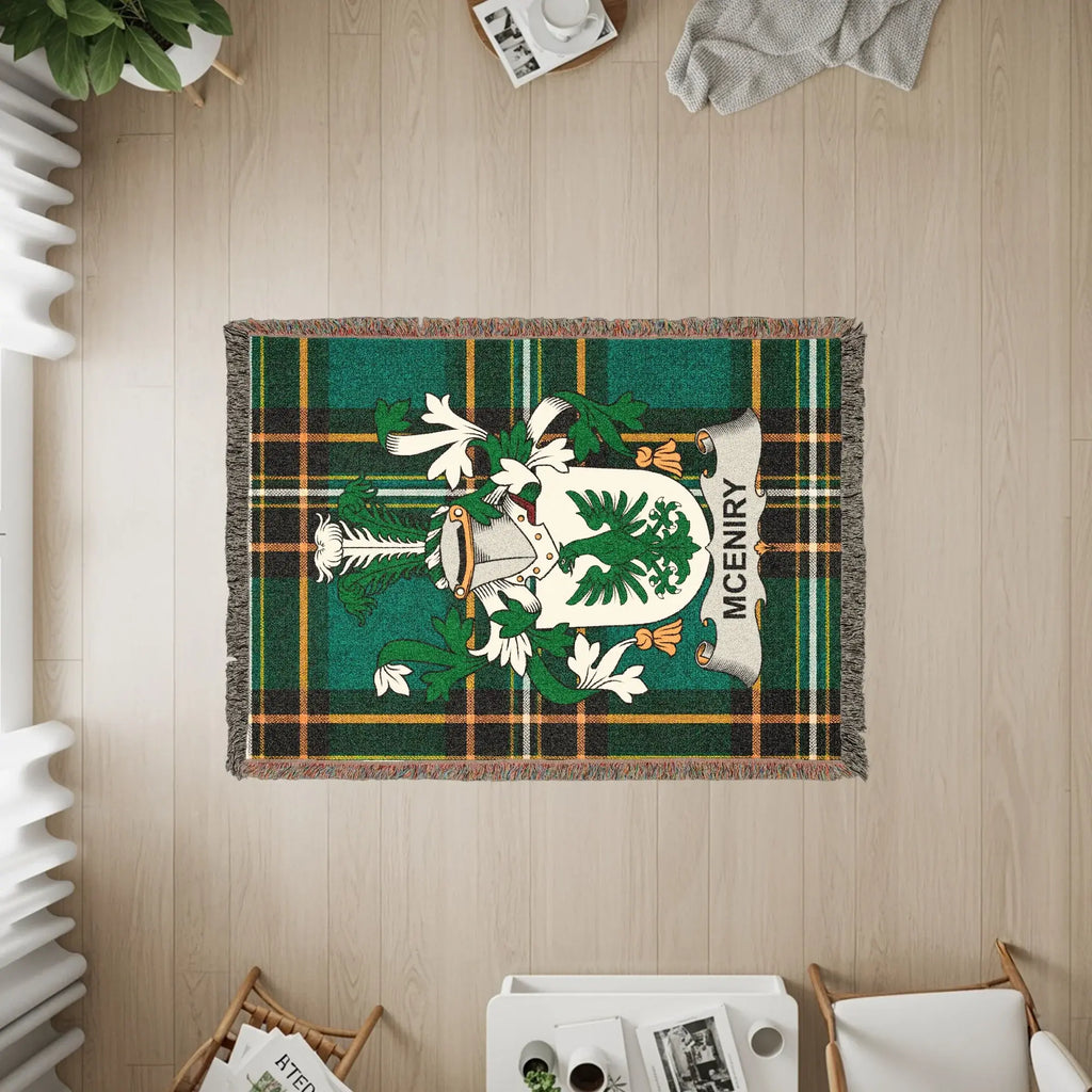 McEniry tartan throw blanket with a central coat of arms.