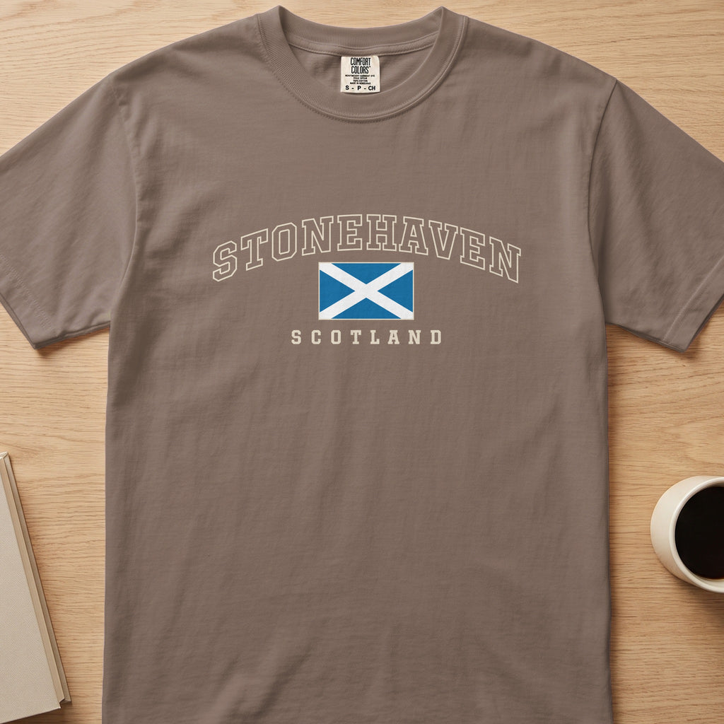 Espresso Stonehaven Scotland Comfort Colors T-shirt laid flat, showing the Saltire front design