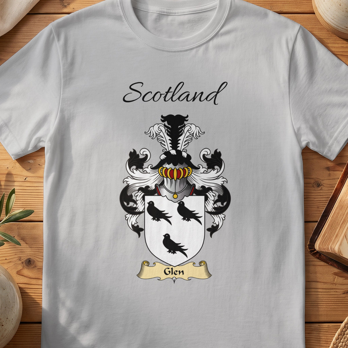 Sport Grey Glen Scottish family shield T-shirt featuring three black birds on a white shield