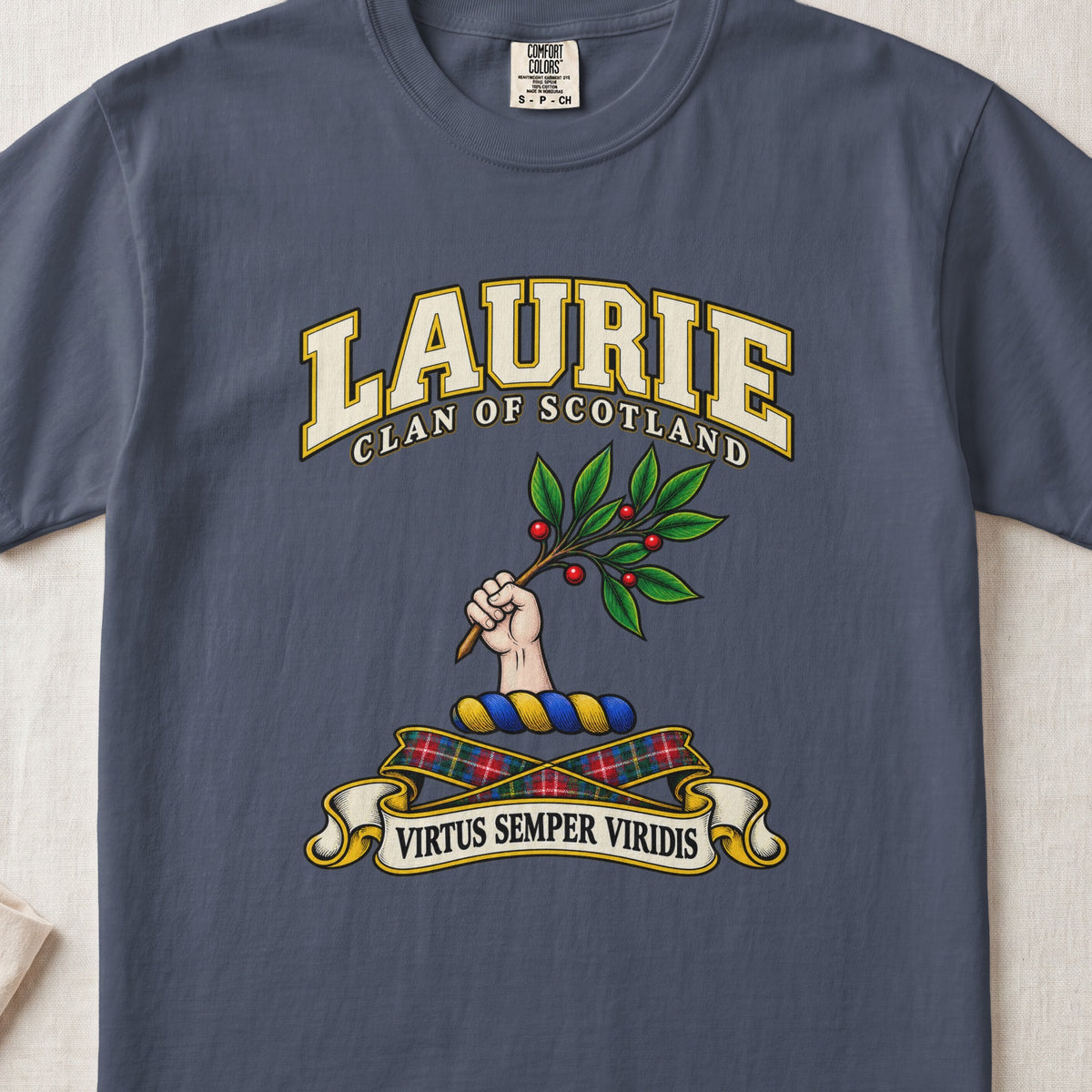 Laurie Scottish clan T-shirt in Midnight, front view with a hand holding a leafy branch with red berries and motto design.