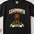 Learmonth Scottish clan T-shirt in Black, front view with a red rose with green leaves and motto design.