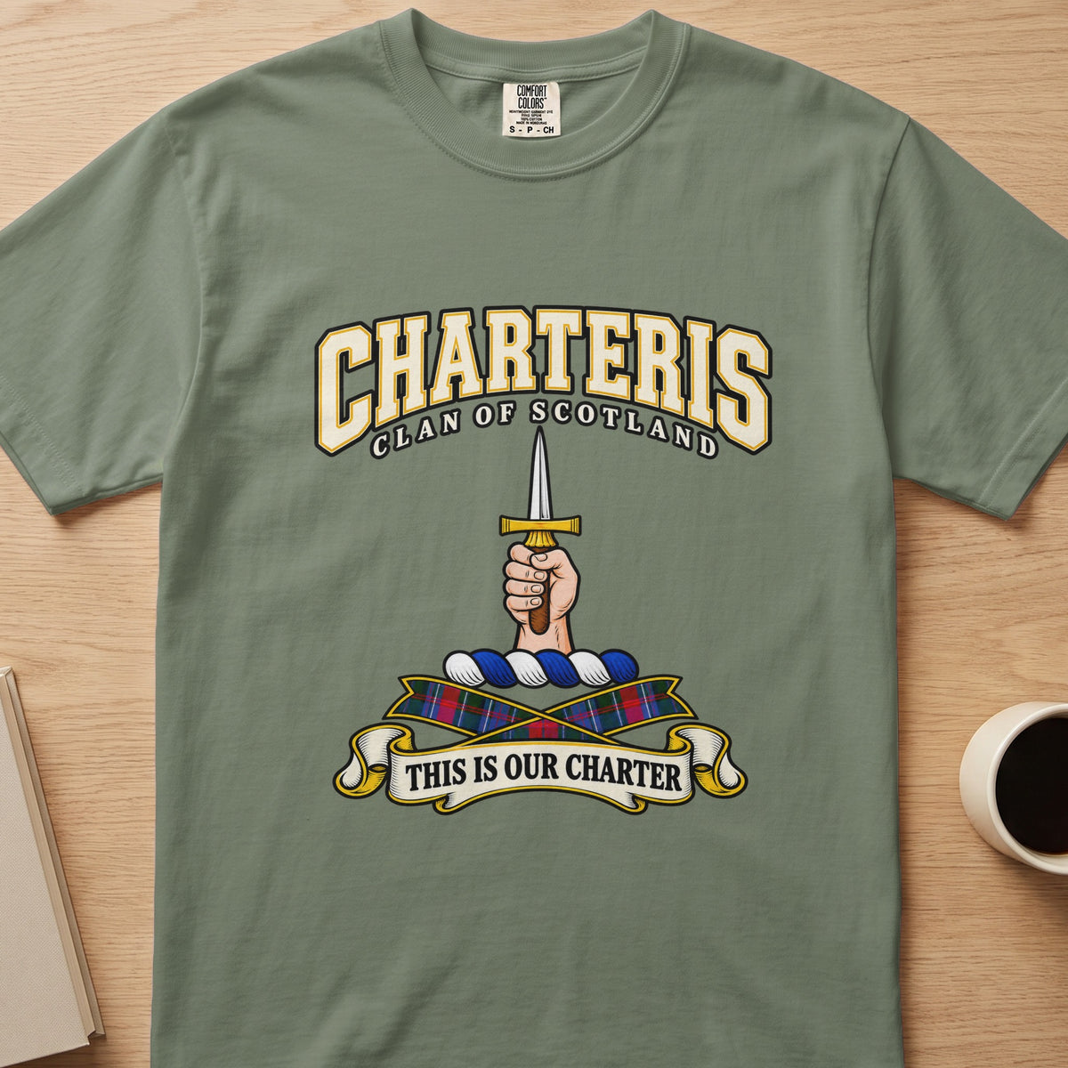 Charteris clan T-shirt in sage green, front view with hand holding an upright sword