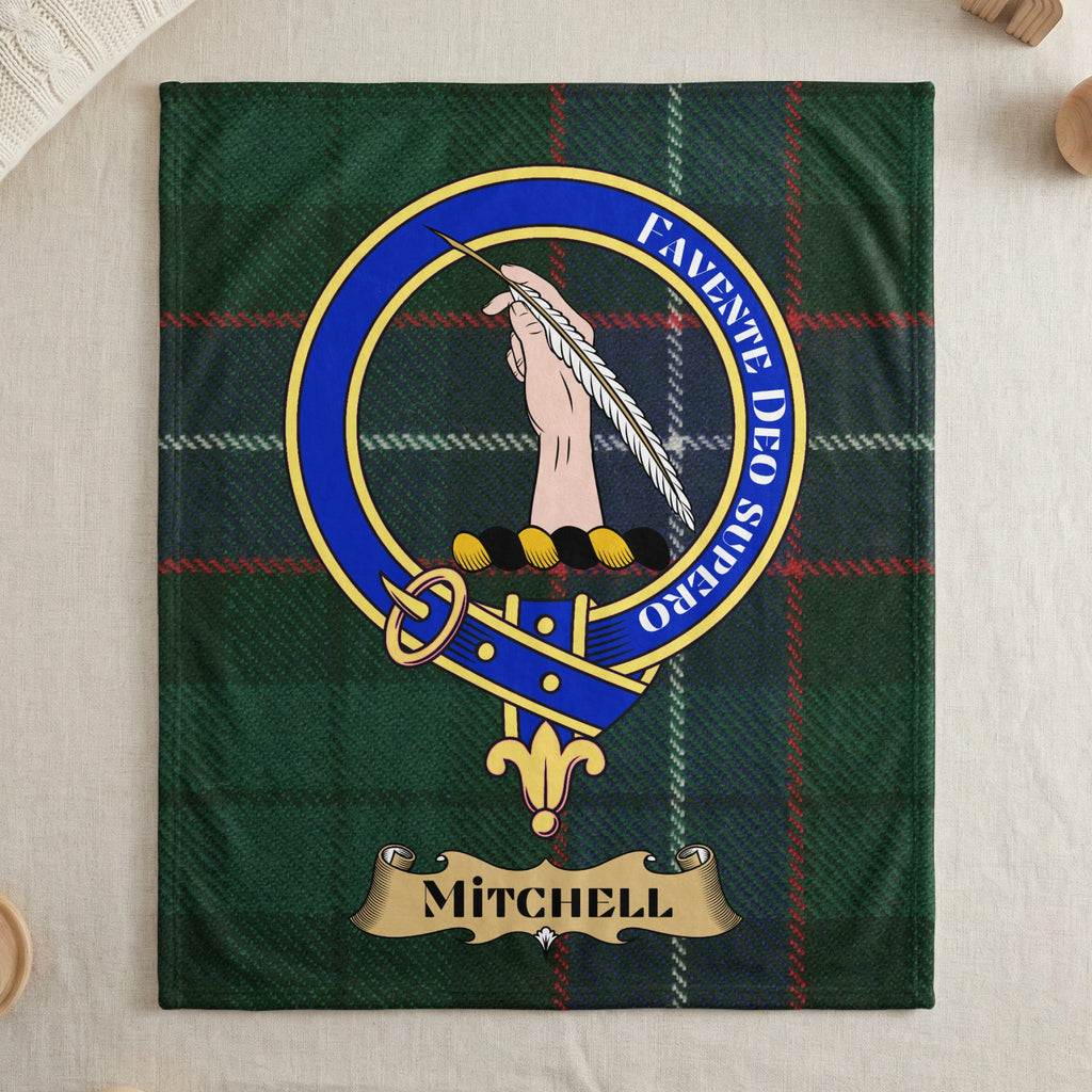 Mitchell name and crest on green tartan throw blanket — draped display