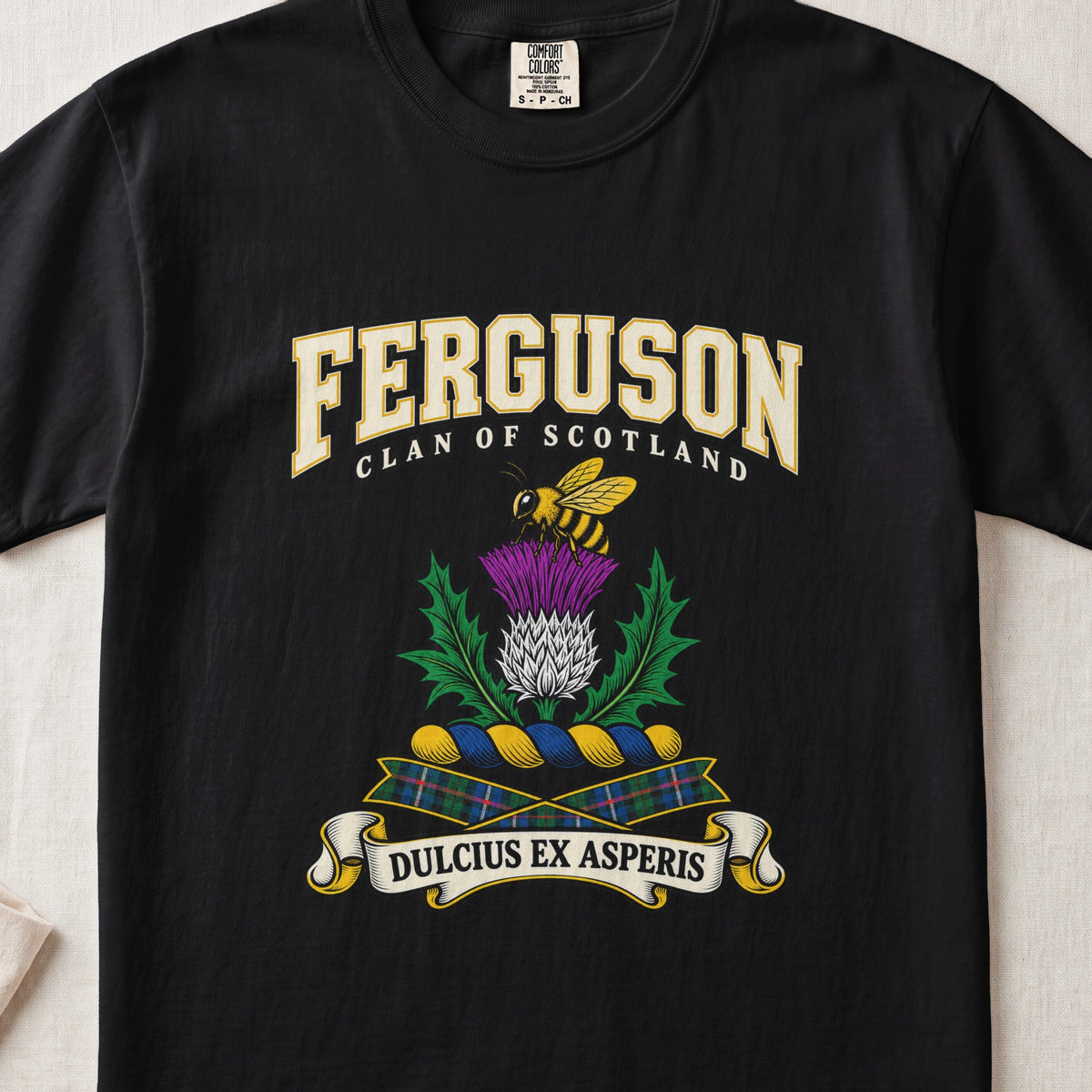 Ferguson graphic T-shirt in Black, front flat lay showing varsity lettering and yellow and black bee above a purple and white thistle.