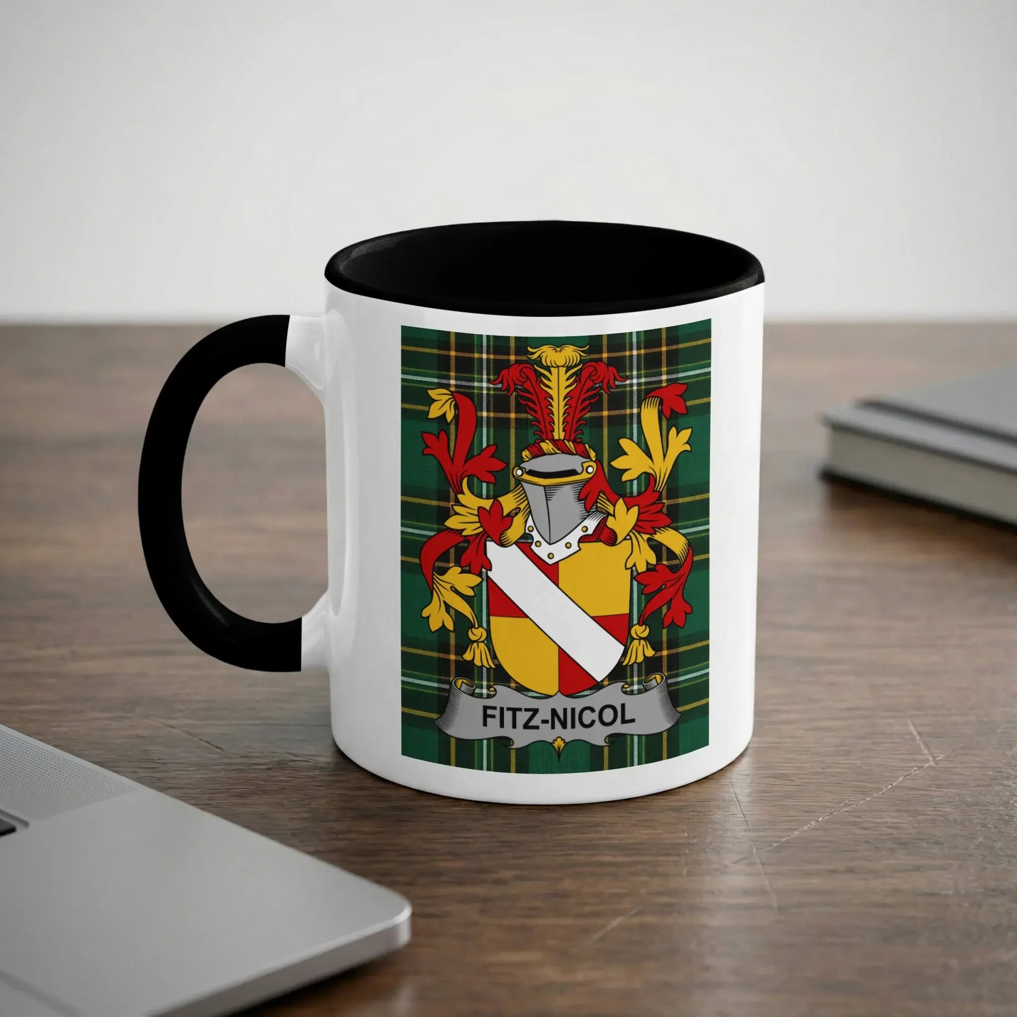 Mug with Fitz-Nicol coat of arms on a wooden desk.