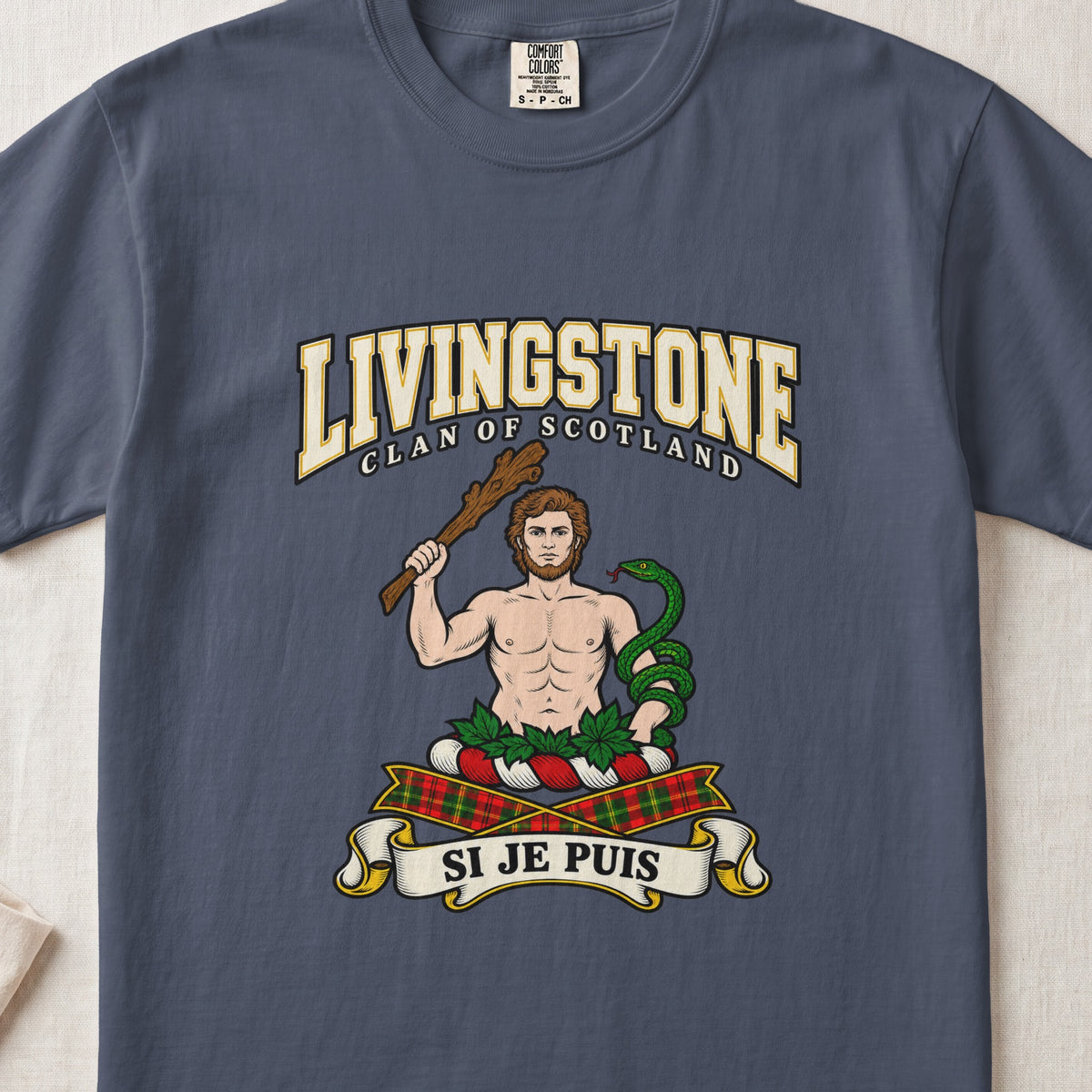 Livingstone graphic T-shirt in Midnight blue, front flat lay showing varsity lettering and bare-chested man holding a wooden club with a green snake coiled around the other arm.