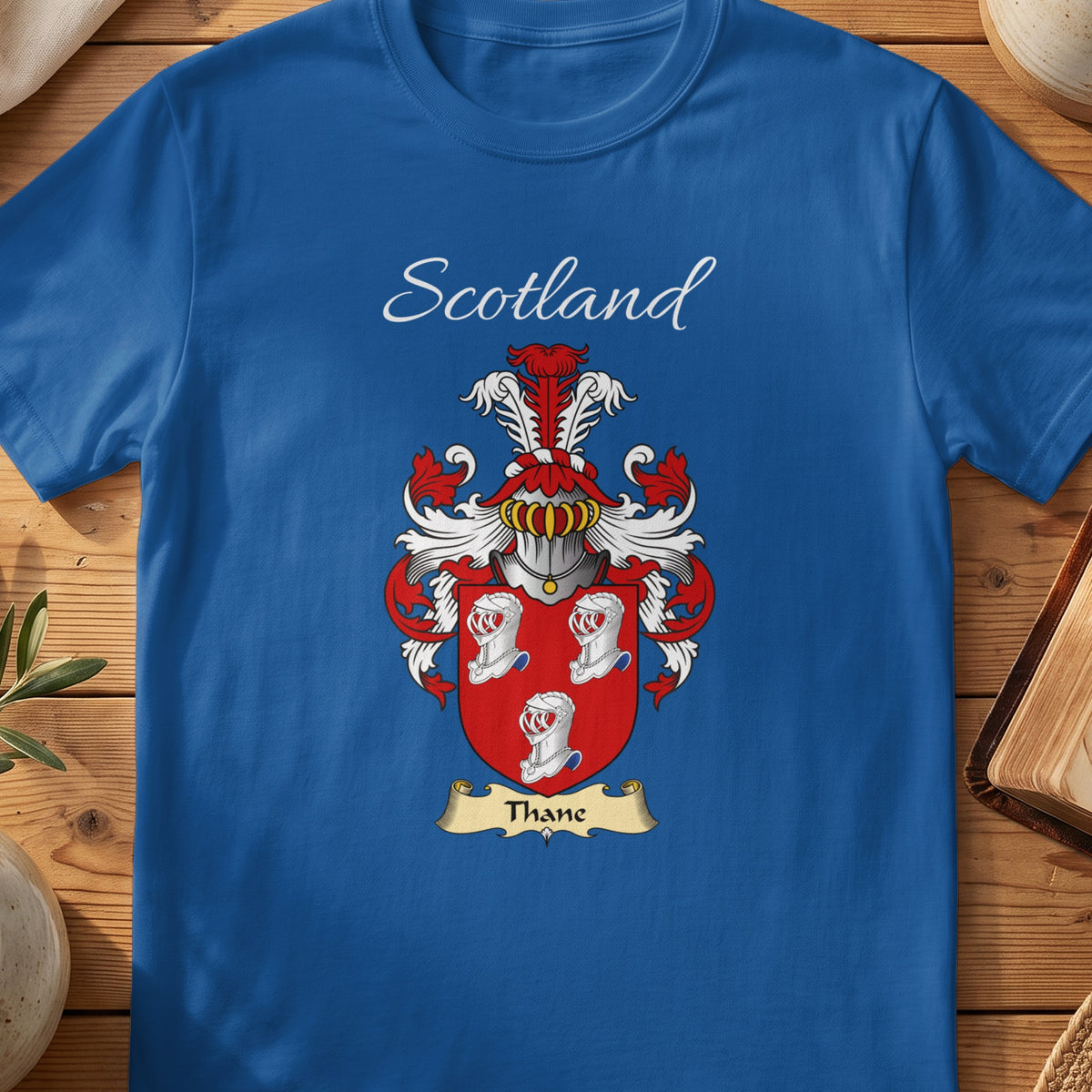 Royal blue Thane unisex heritage T-shirt with the family shield and surname design.