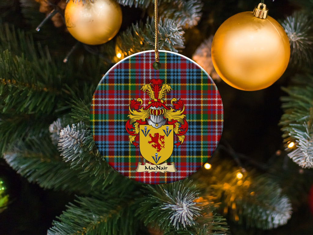 MacNair family emblem ceramic Christmas ornament with Caledonia tartan background in festive holiday décor
