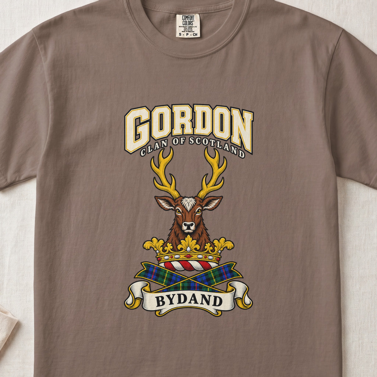 Gordon graphic T-shirt in Espresso brown, front flat lay showing varsity lettering and forward-facing brown stag head with gold antlers.