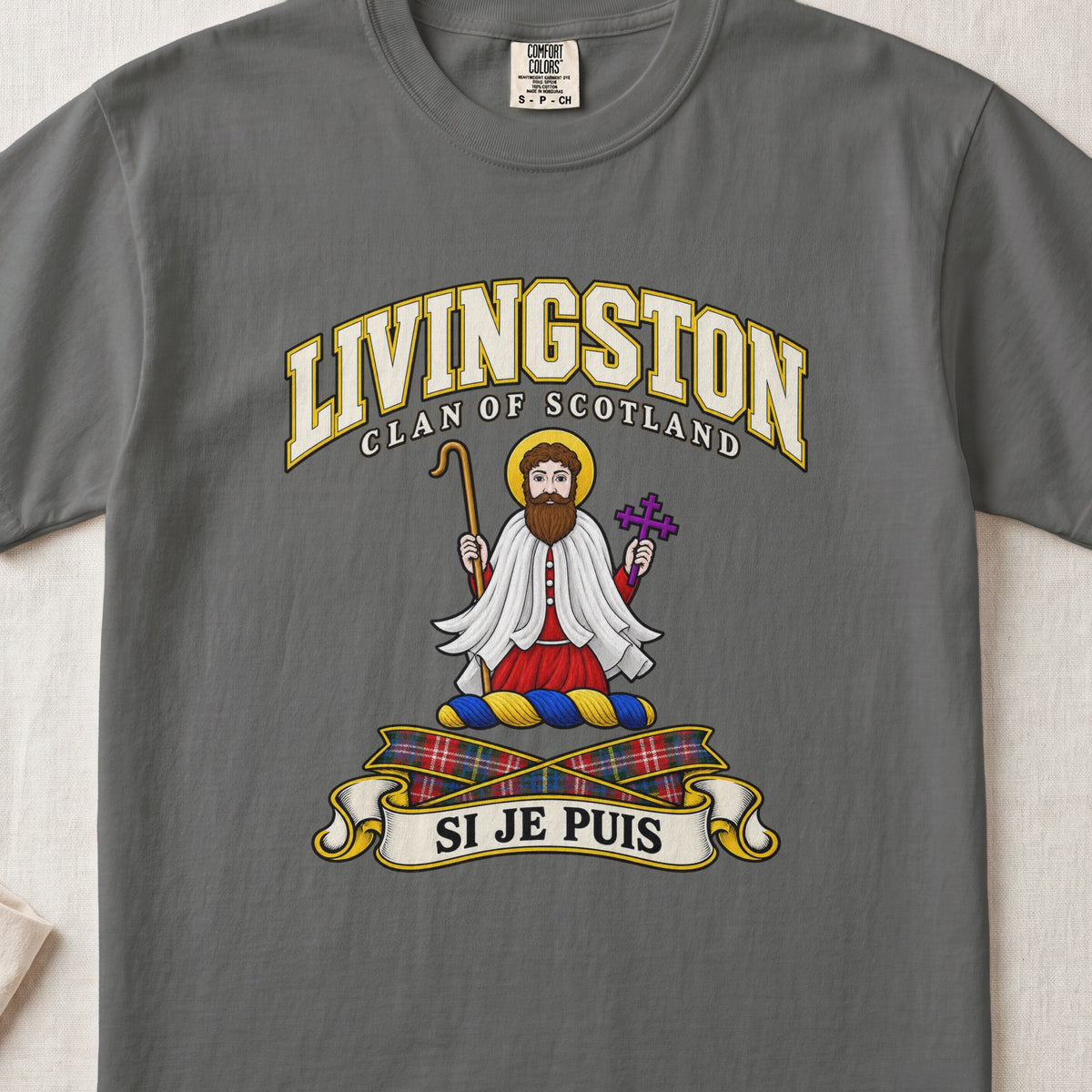 Livingston Scottish clan T-shirt in Pepper, front view with a robed figure with a golden halo and motto design.