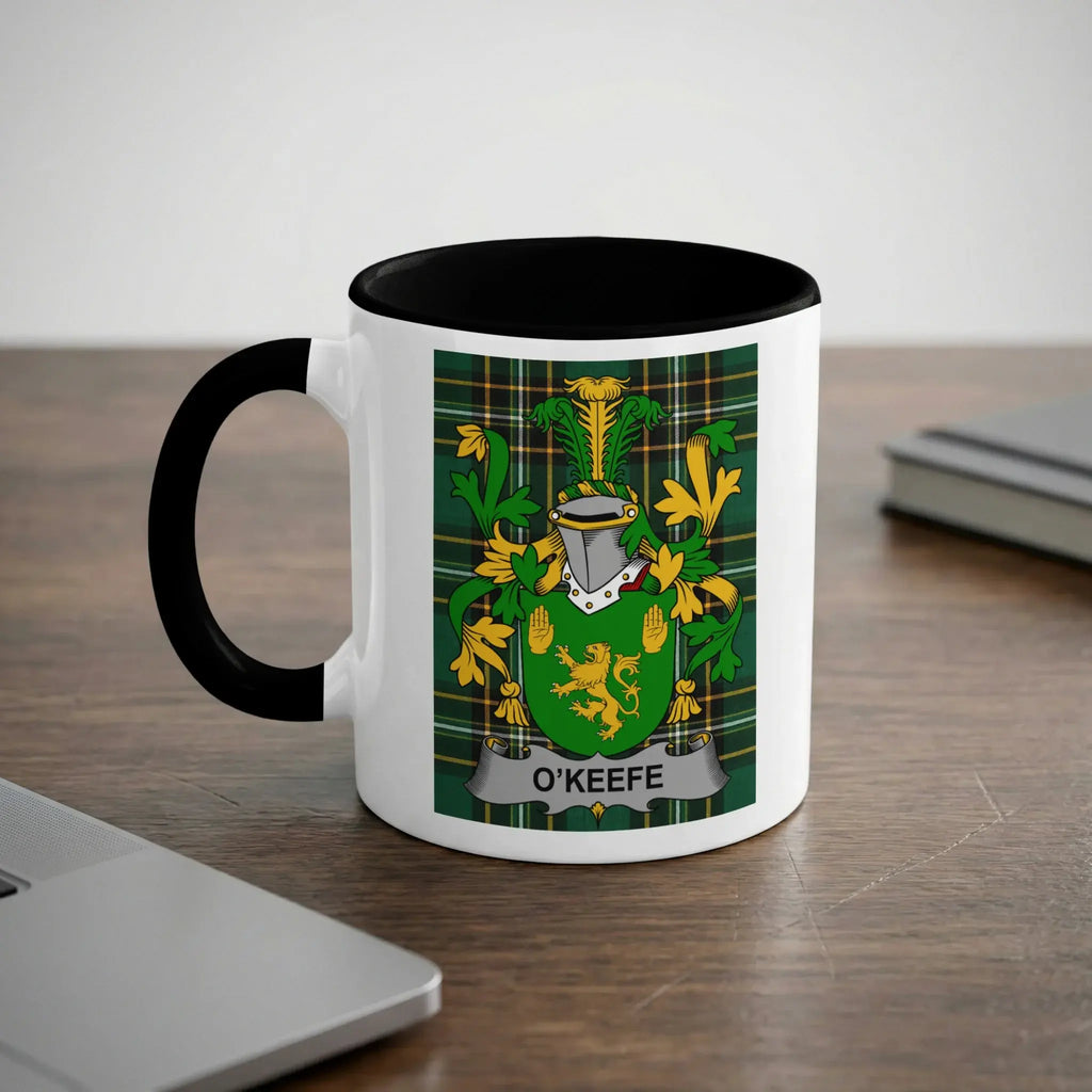 White mug with black handle featuring O'Keefe family crest.