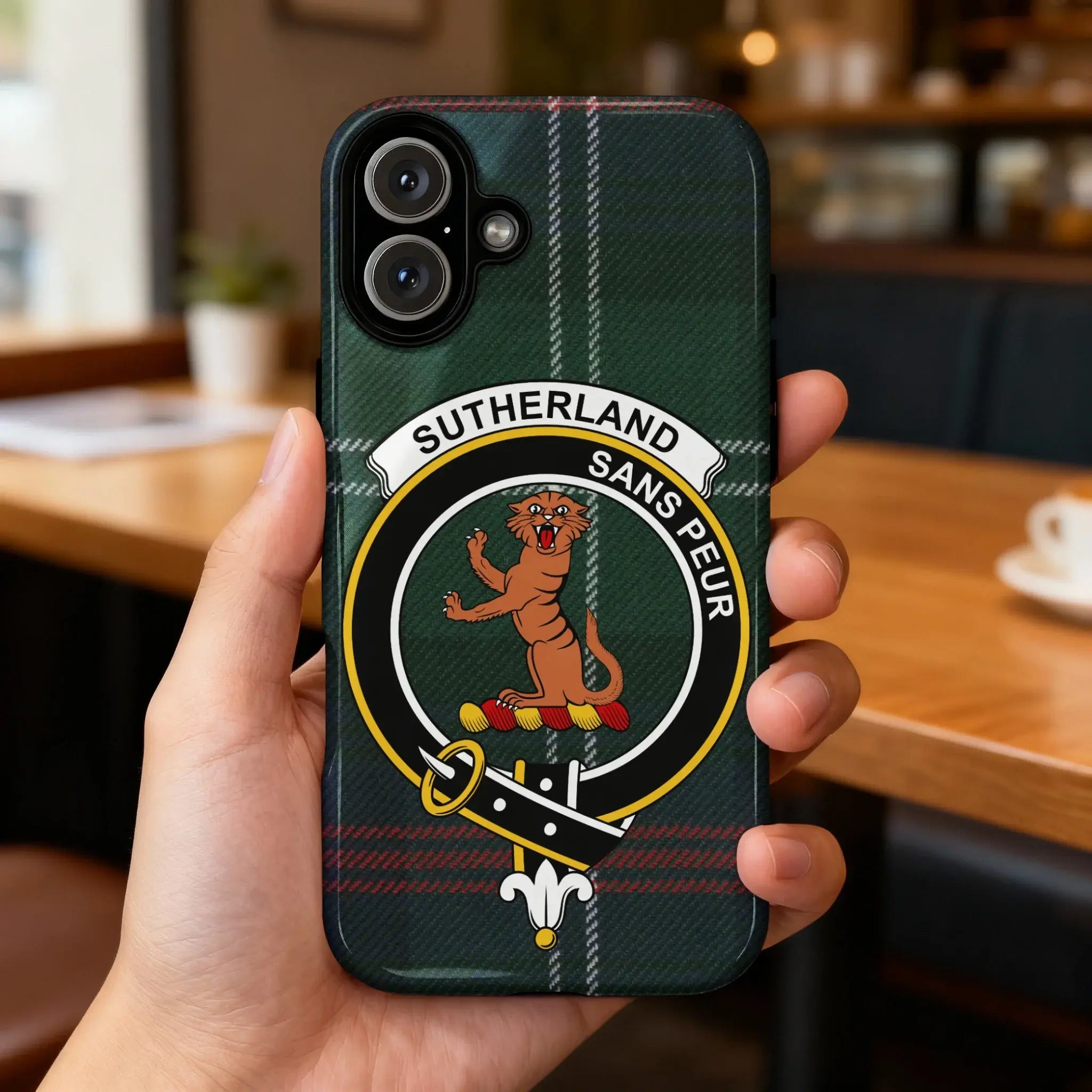 Clan Sutherland sans peur crest phone case — glossy edge-to-edge wild cat print, iPhone shown