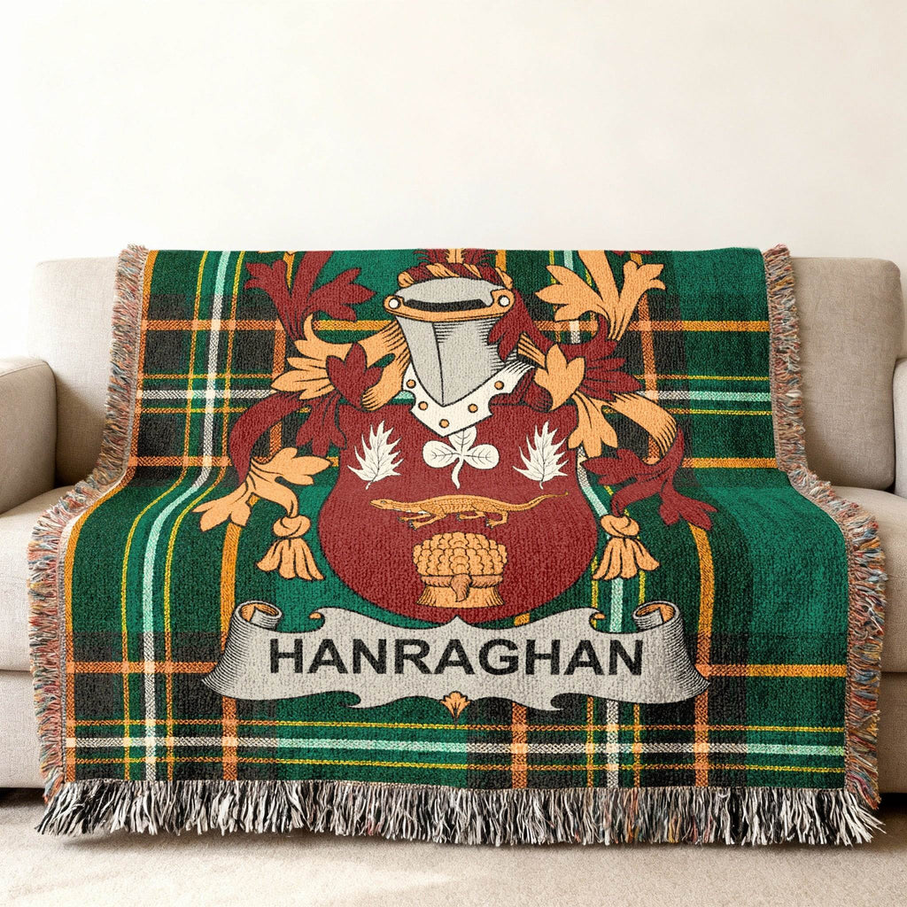 Woven blanket with tartan plaid and a coat of arms for "HANRAGHAN".