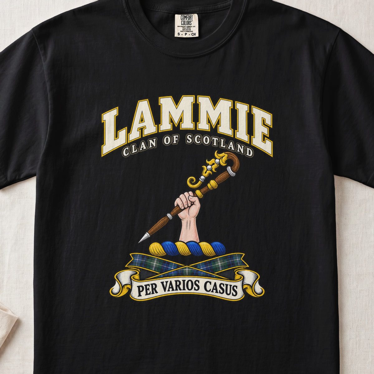 Lammie Scottish clan T-shirt in Black, front view with a hand holding an ornate crozier and motto design.