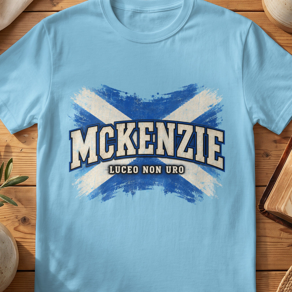 McKenzie Scottish Saltire T-shirt in Sky, with distressed blue and cream flag and “Luceo Non Uro” lettering.