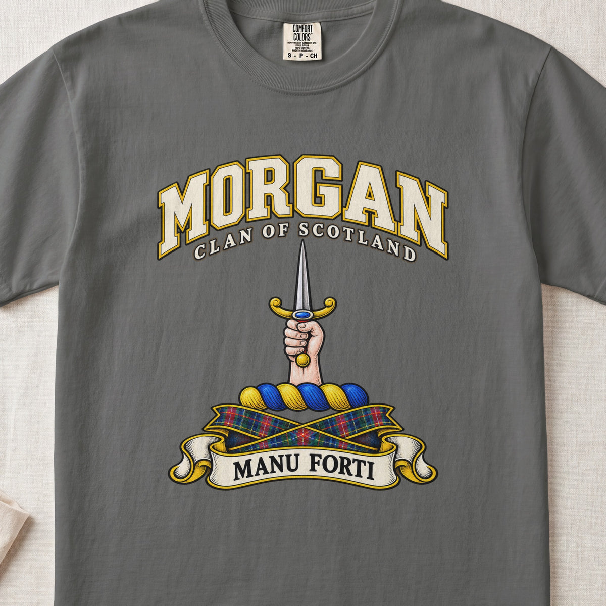 Morgan Scottish clan T-shirt in Pepper, front view with a hand holding an upright dagger and motto banner.