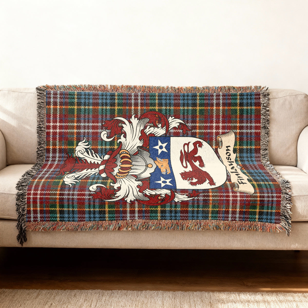 Finlayson Scottish woven blanket with family shield and Caledonia tartan background