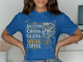 Blue t-shirt with "My Ancestors Didn't Cross The Glens For Weak Coffee" text and a mug design.